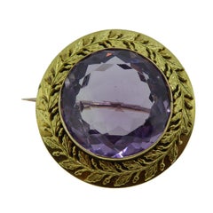 Victorian Amethyst Brooch in Gold Foliate Pattern Setting Victorian Amethyst Brooch in Gold Foliate Pattern Setting