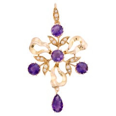 Victorian Amethyst & Pearl Ribbon Motif Pendant in 15 Karat Yellow Gold