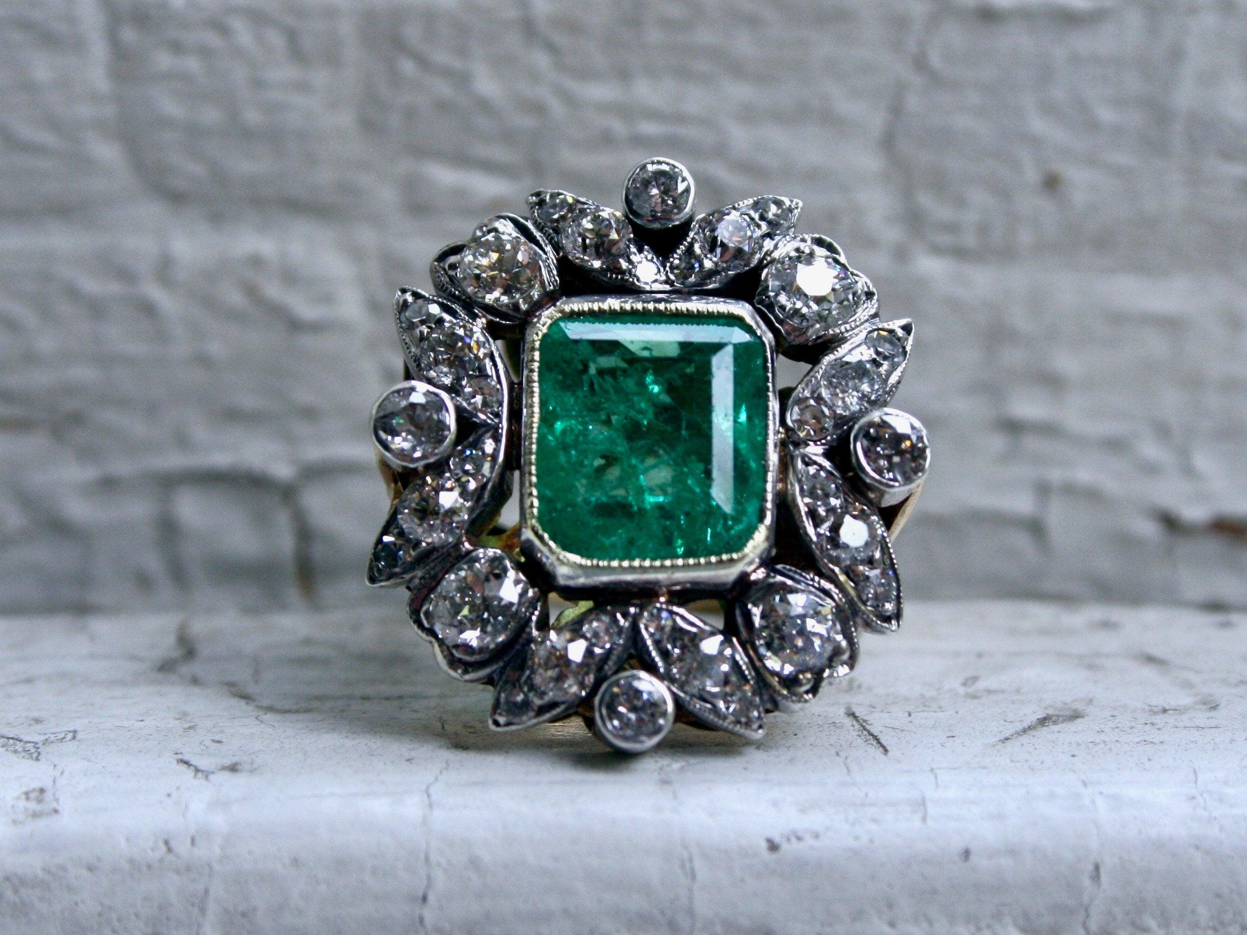 I'm so in LOVE with this Stunning Antique Victorian Diamond and Emerald Halo Ring - it is amazing! Crafted in 18K Yellow Gold, the ring is beautifully designed with a center Natural Emerald, surrounded by leaves of super sparkly diamonds, with a