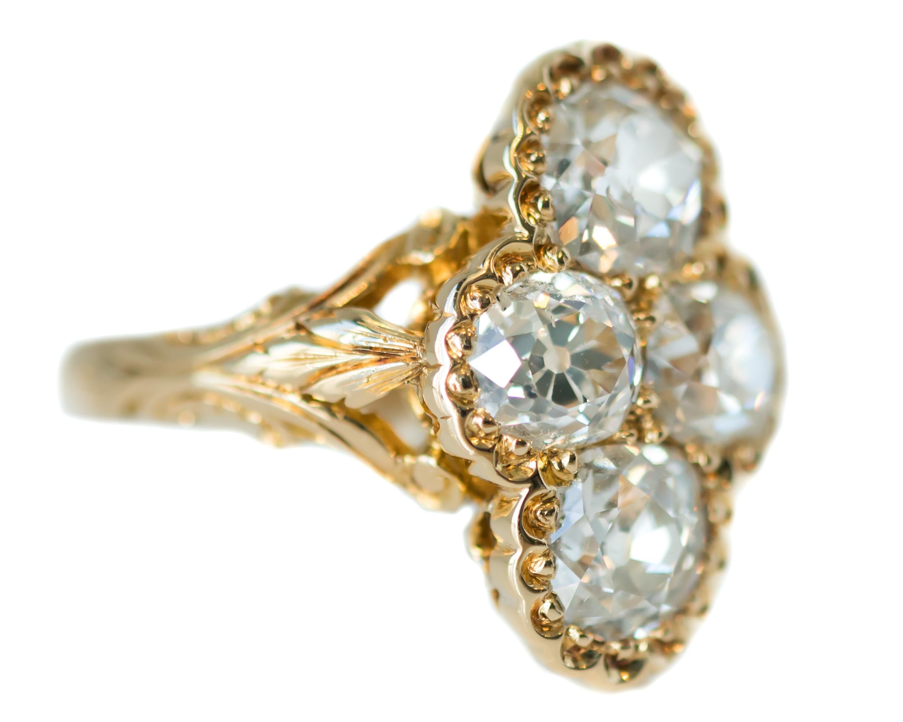 Antique Victorian Diamond Ring - 18 Karat Yellow Gold, Old Mine Diamonds

Features:
2.2 carat total Old Mine Diamonds ( Quantity 4)
18 Karat Yellow Gold Setting
Each stone is set with 12 - 13 Prongs
Delicate Floral Detailed Frame
Open cut out