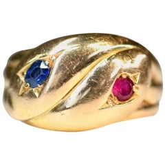 Bague victorienne ancienne en forme de double serpent en saphir et rubis 22 carats