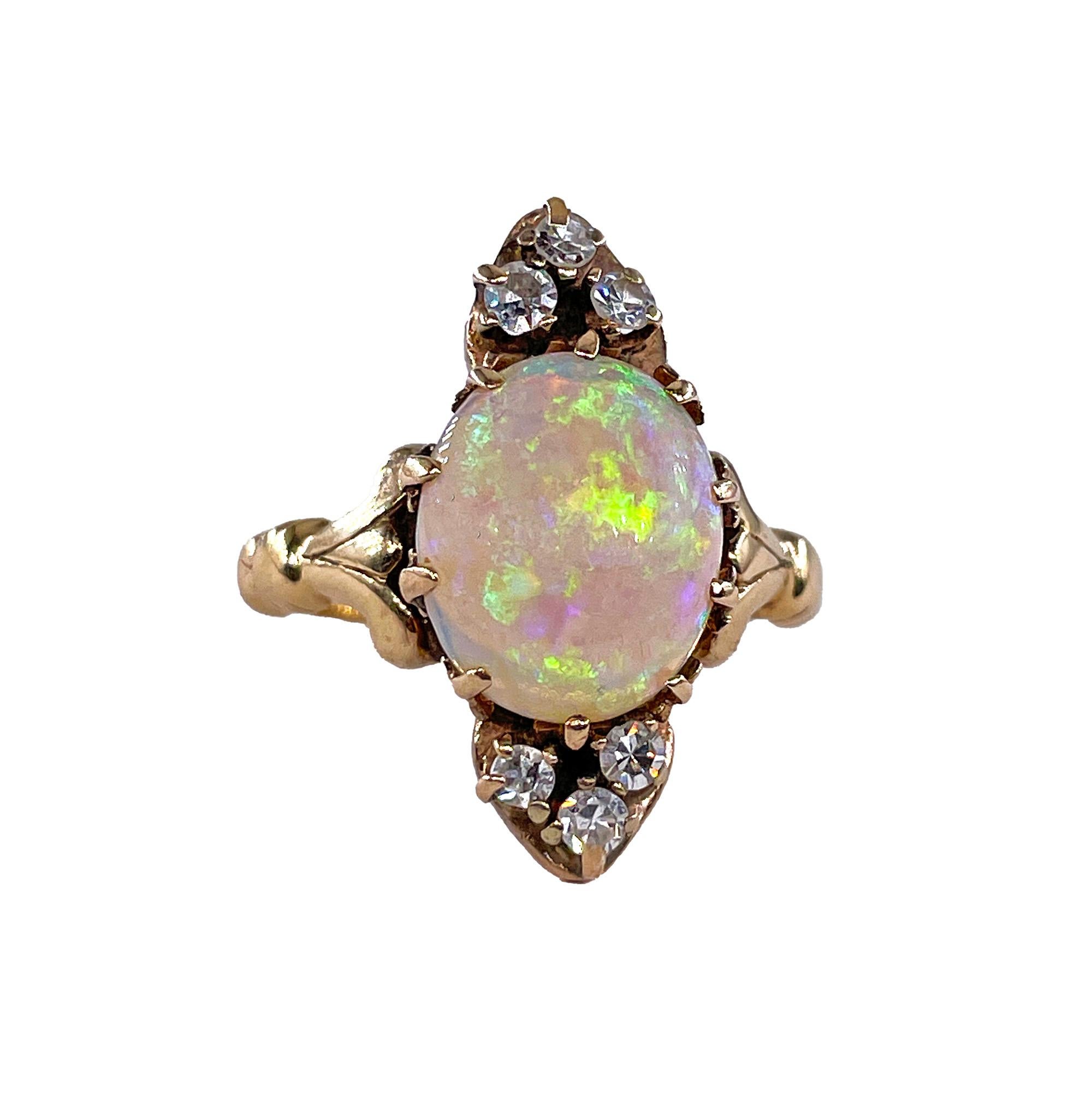 This AUTHENTIC Victorian OPAL and DIAMOND Ring will certainly pick your Imagination. Was it a nineteenth century promise ring of sorts? A gift to mark a special occasion? Whatever the reason, the jewel was no doubt well received.
At its center, a