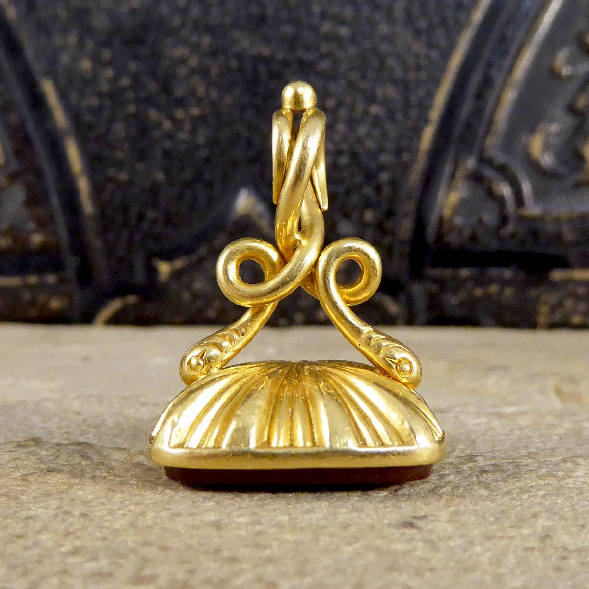 Traditionally found attached to a gentleman's watch chain, which are still worn to this day or hung from a chain as a necklace. This unique antique quality 18ct Yellow Gold fob pendant is set with Agate dating from the Victorian era with clear 18ct