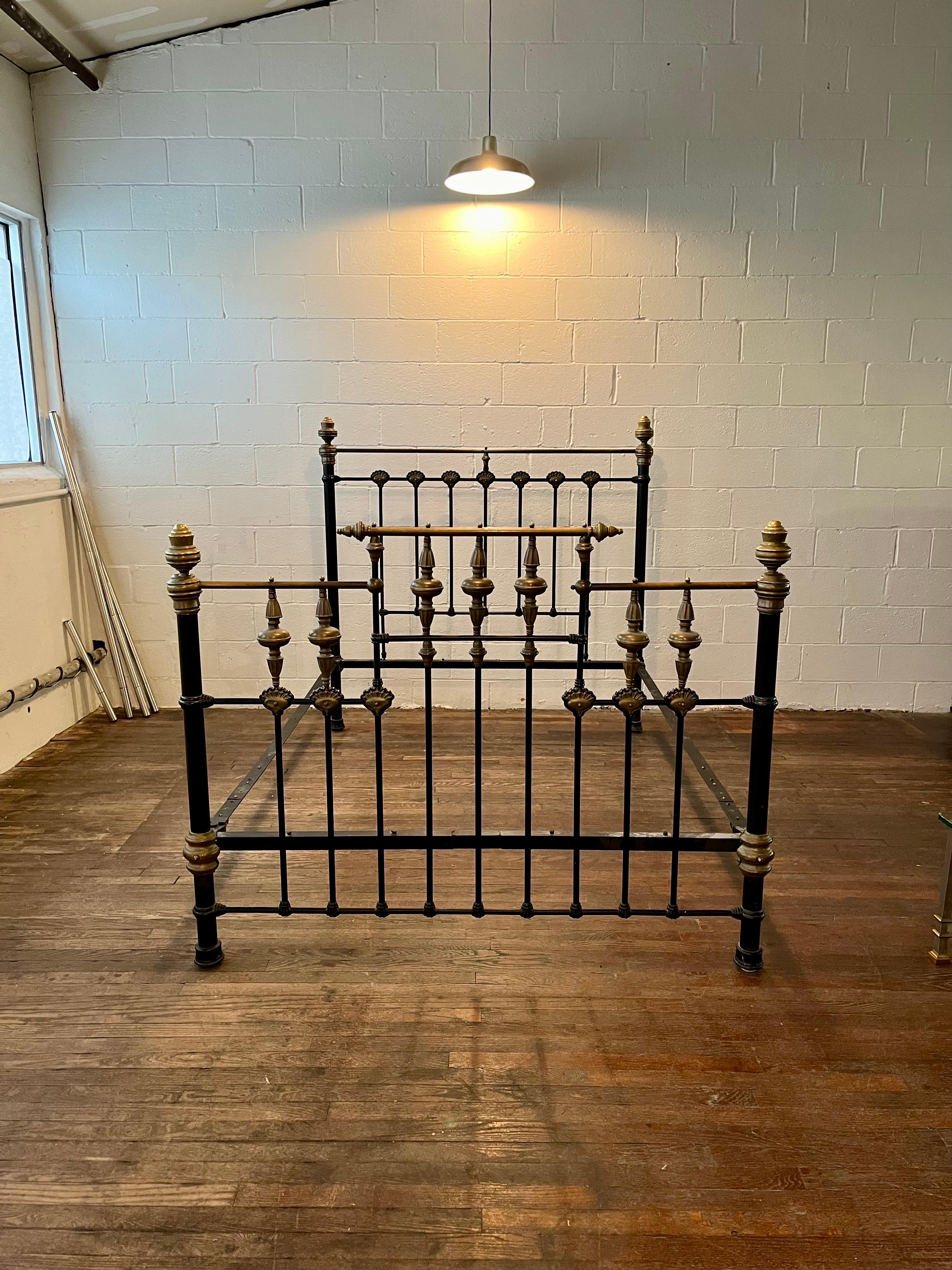Beautiful Victorian Iron and Brass Bed. Amazing proportions with heavy footboard presence. Great brass detailing offsetting black iron frame. 
Curbside to NYC/Philly $400