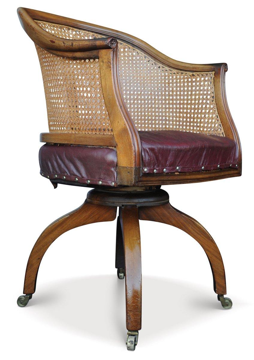 Début de l'époque victorienne Fauteuil pivotant de bibliothèque victorien ancien Bergère avec assise en cuir en vente