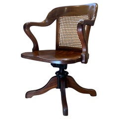 Sedia da scrivania antica vittoriana in mogano Bergere con braccioli aperti e seduta a sella