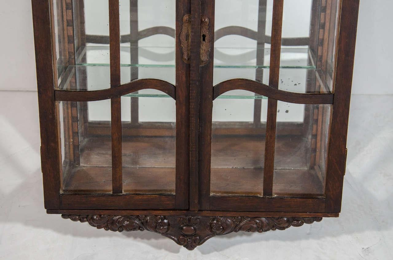 Victorian Antique Curio Cabinet with Hand Carved Wood Designs For Sale 1