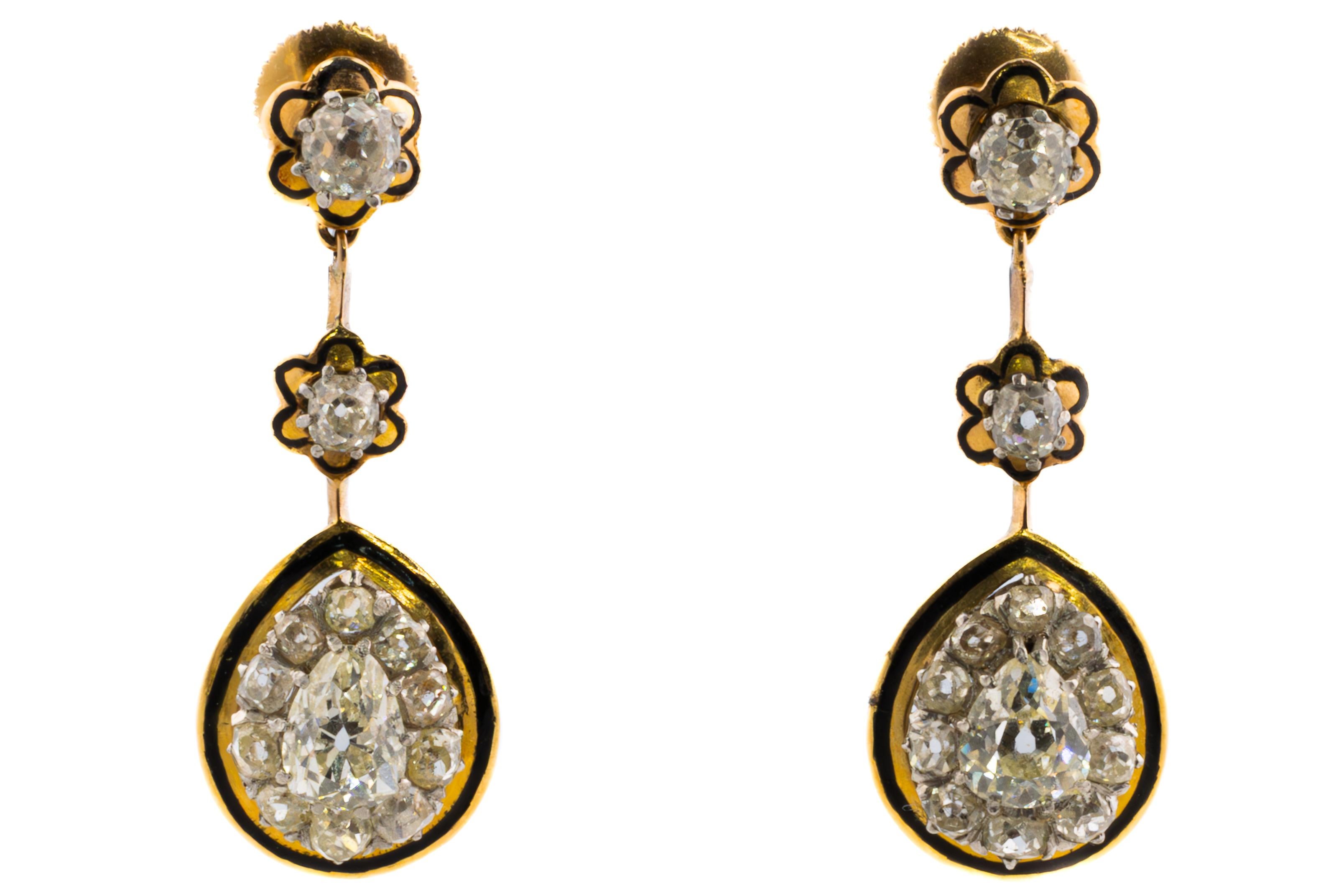 Victorian Antique Cut Diamond & Enamel Earrings

These captivating earrings, crafted from 18-karat yellow gold with delicate enamel detailing, embody the timeless elegance of circa 1900 jewelry. Each piece is adorned with a pear-shaped diamond,