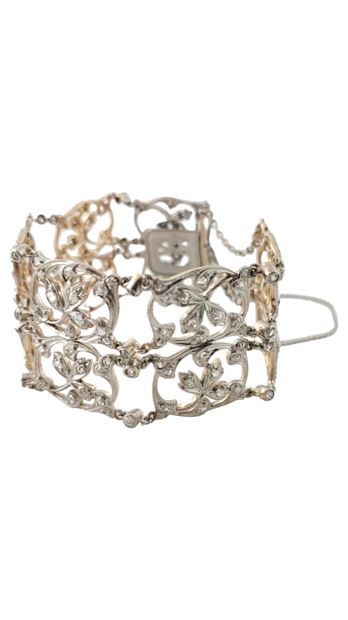 Delicate Victorian Antique Design Platinum 18K Rose Gold Diamond Bracelet

Gorgeous platinum 18K rose gold diamond bracelet with a floral motif!

Milgrain bezel and bead set rose cut diamonds 

Rose cut diamonds are of SI1 - I1 clarity, and H-I