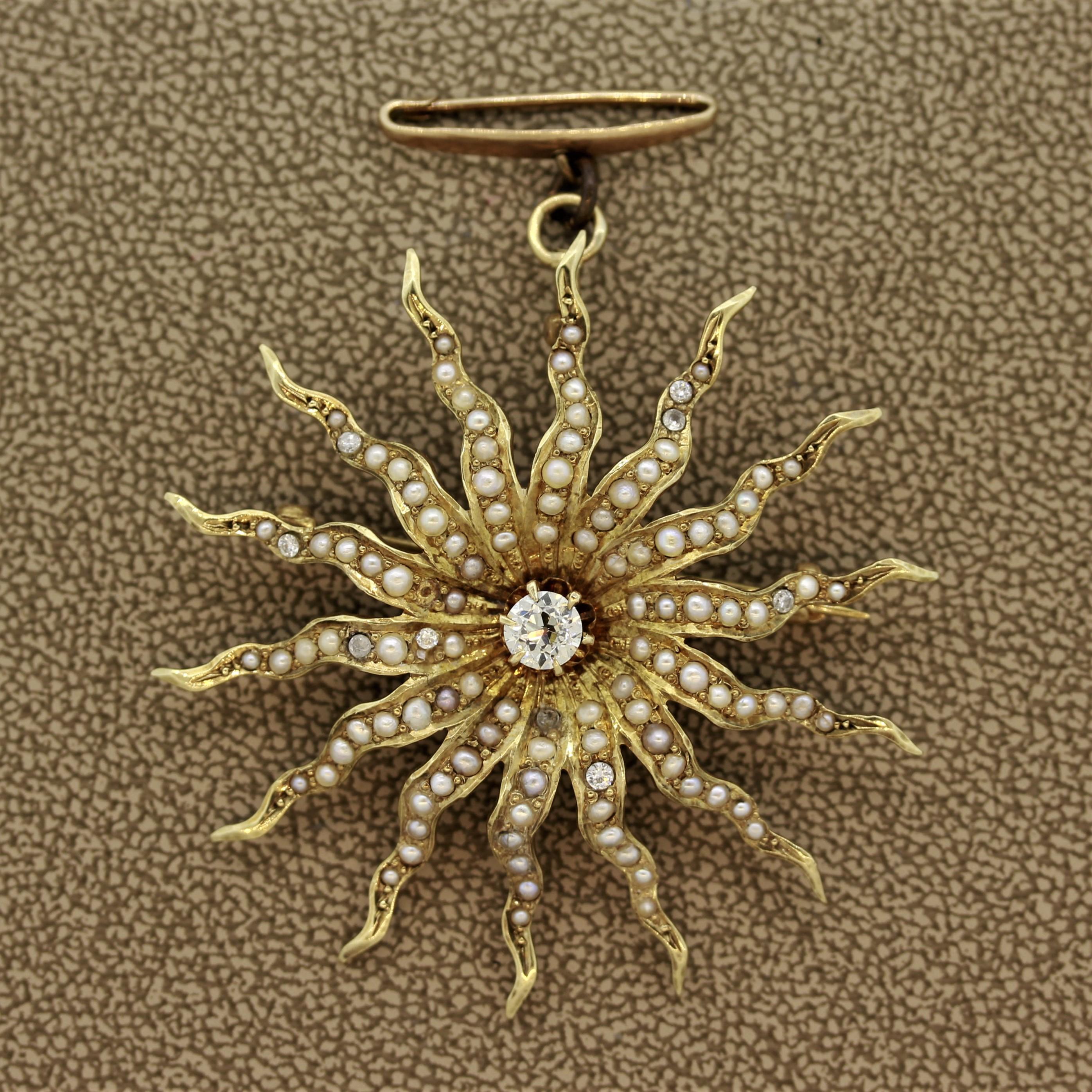A classic sunburst motif made in the 1890’s. This antique features a large half carat old mine cut diamond in the center of the piece. The rays of the sun are set with natural seed pearls and smaller diamonds. Made in 14k gold and can be worn as a