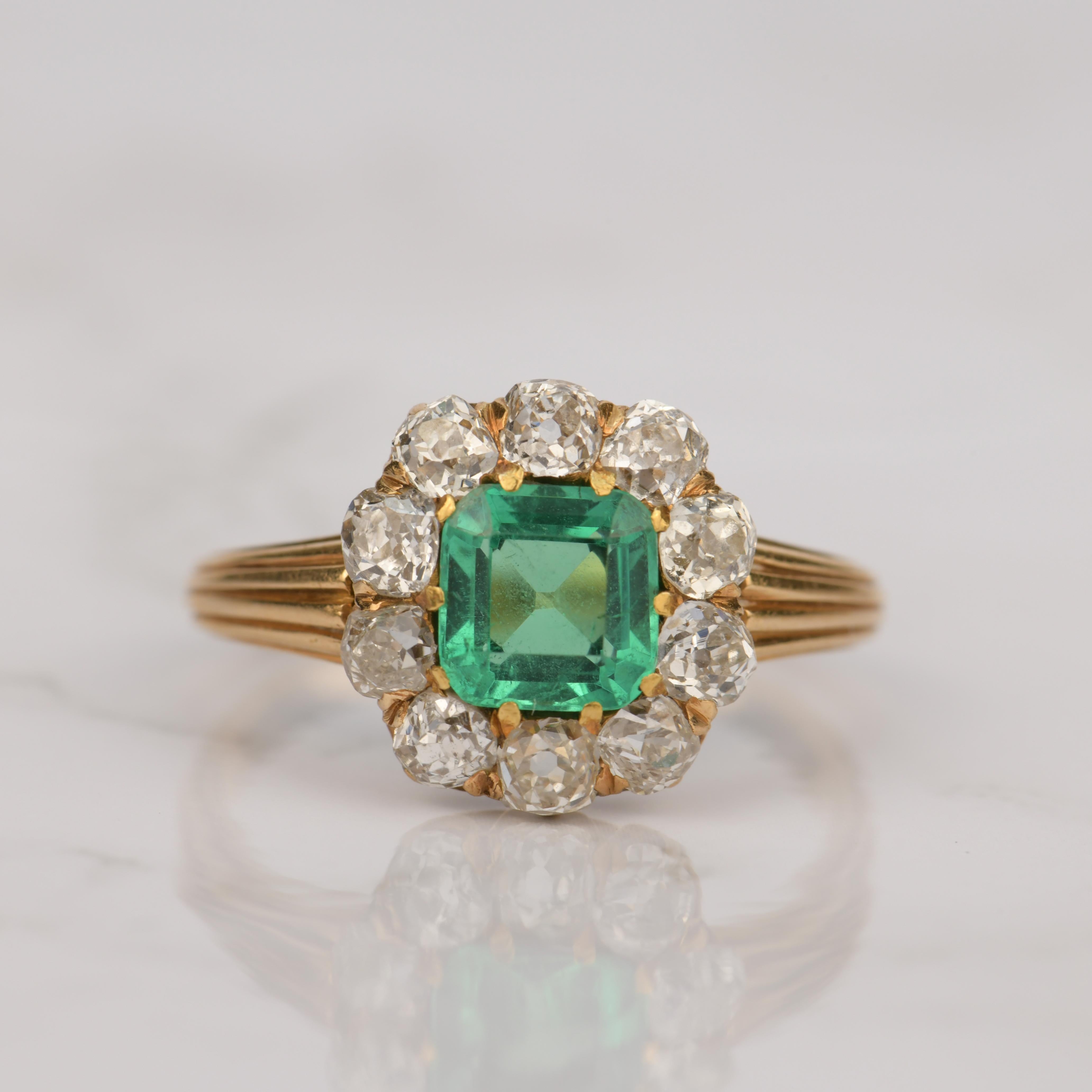 emerald cluster engagement ring