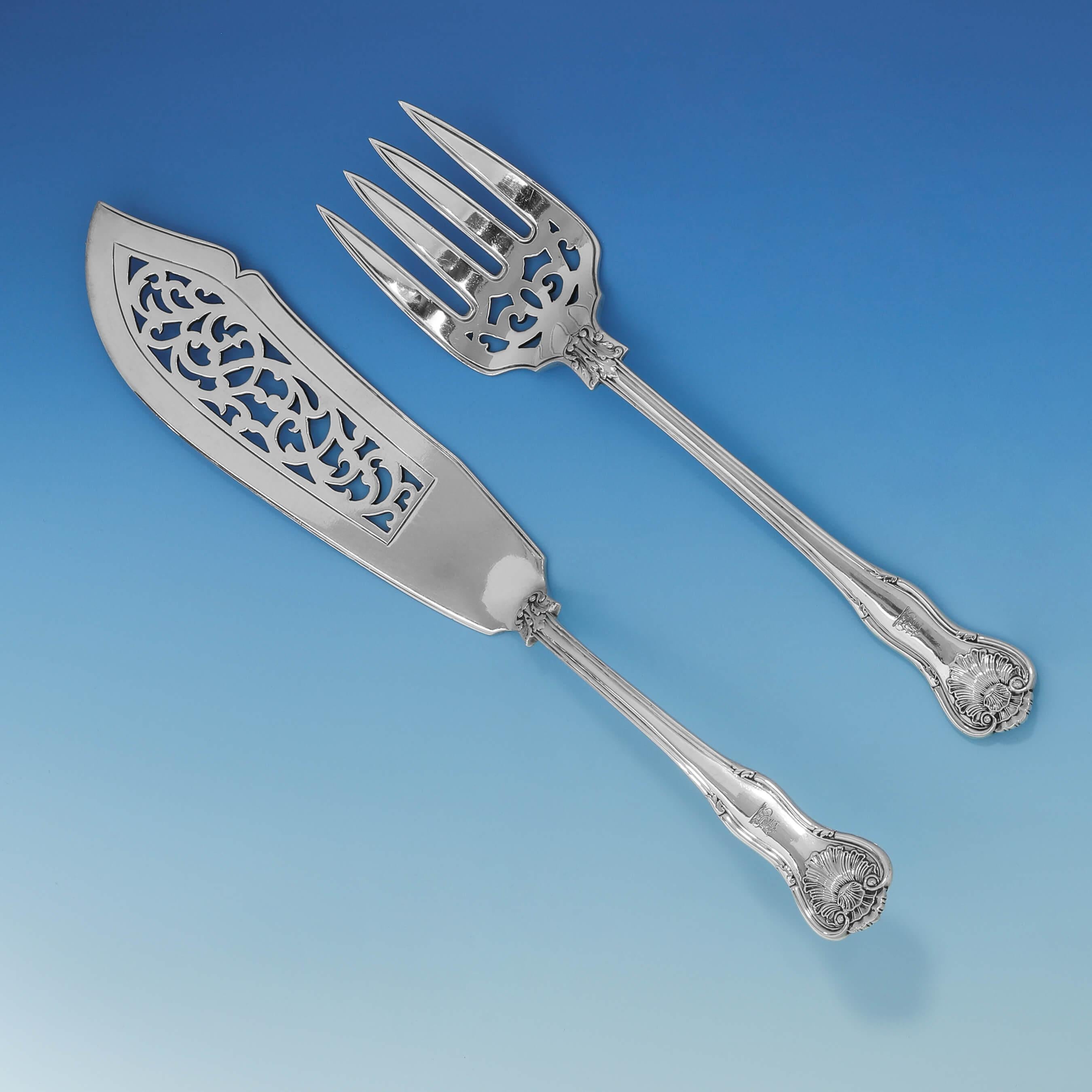 Hallmarked in London in 1893 by Aldwinckle & Slater, this attractive pair of Victorian, antique sterling silver fish servers, is in 'Kings Husk' pattern. The fish knife measures 12.75