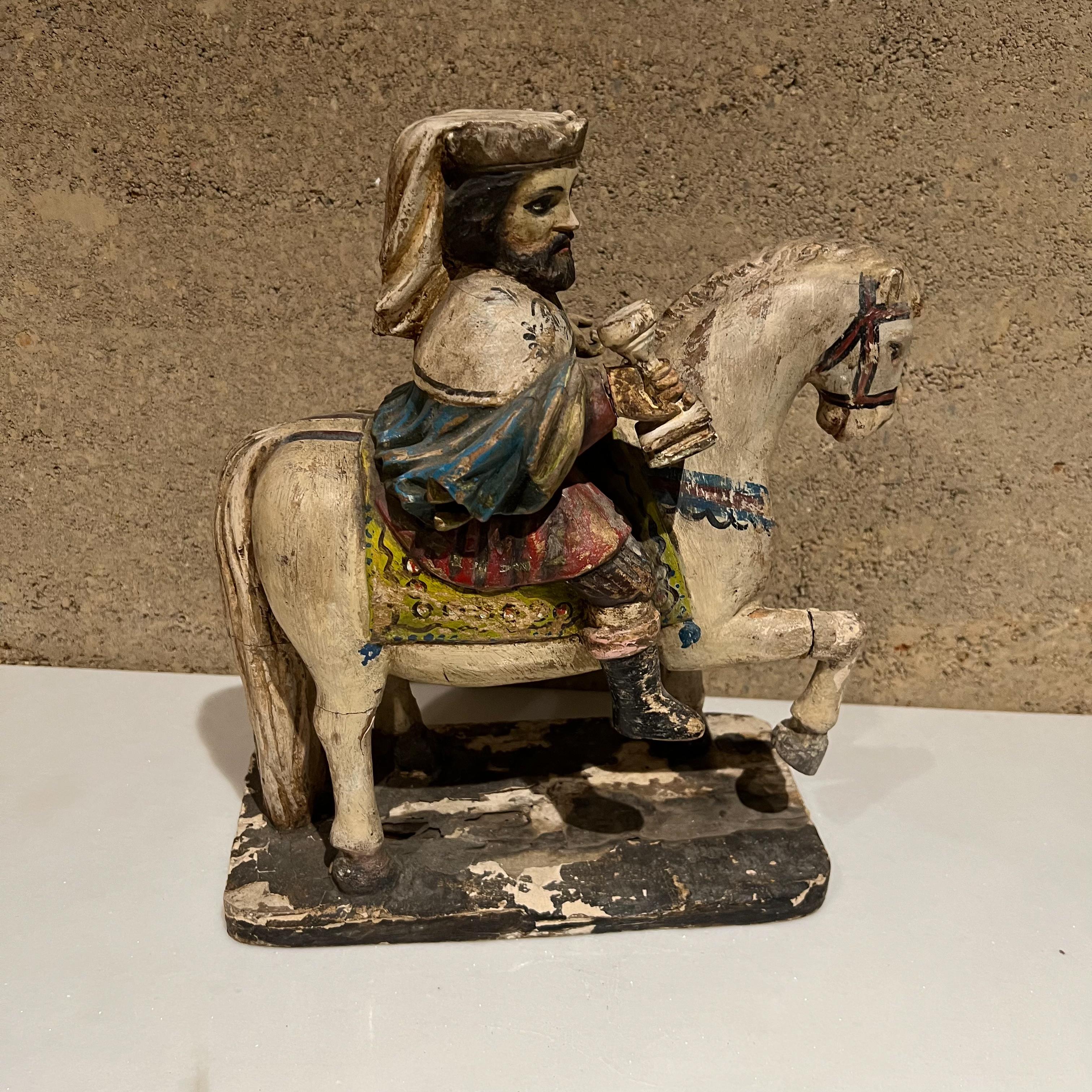 19th Century Spanish Art Sculpture apostle St James the Great on majestic customary white horse political religious figure Santiago Matamoros 
Beautifully hand painted carved in solid wood decorated by hand.
11.5 tall x 10.5 w x 4.75 d
Original