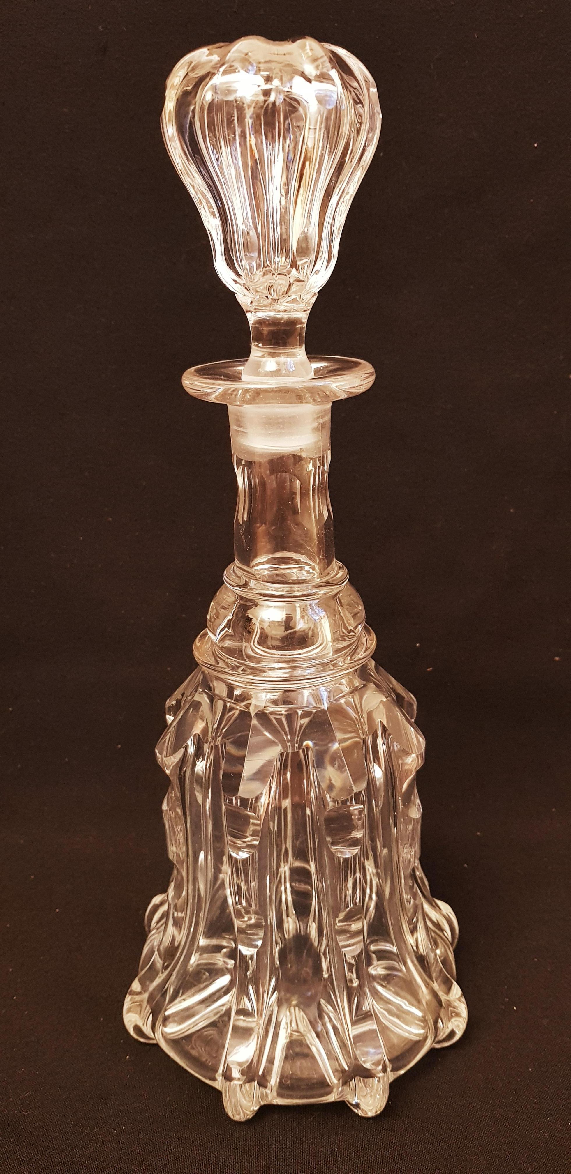 Antique Victorian bell shaped crystal decanter hand crafted and cut with moulded vertical pillars broad shoulder. This shapes is commonly known as Newcastle design, England (1850-1860), brilliant condition.