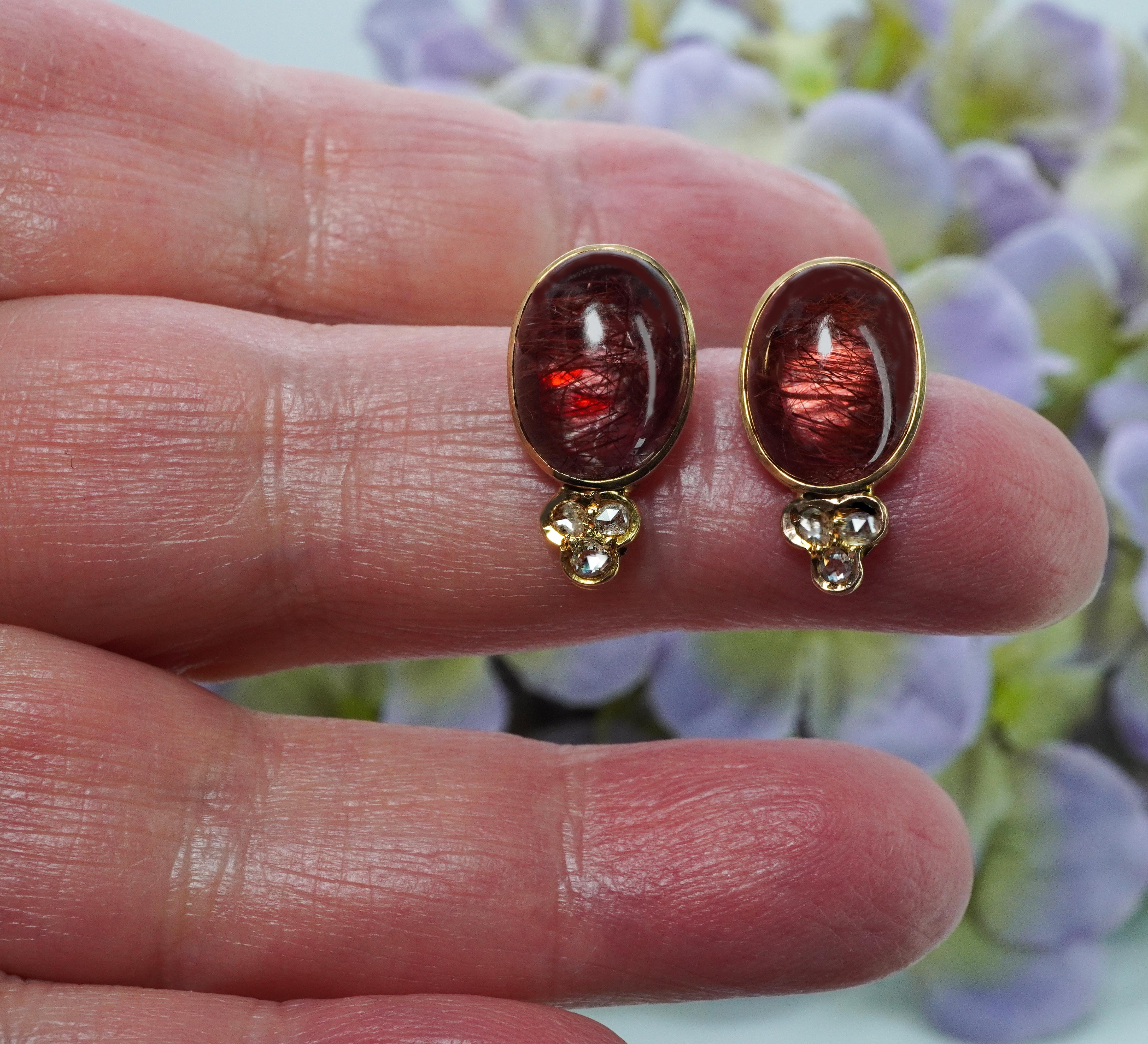  Victorian Antique Red Rutilated Quartz Rose cut Diamond Earrings 14K Gold

This is a gorgeous antique pair of earrings crafted in 14K yellow gold (tested). The settings are so wonderful, nostalgic looking and well preserved! Featured is a genuine