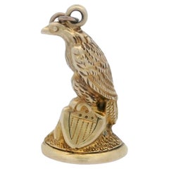 Victorian Antique Seated Eagle and Shield Charm in 10K Yellow Gold with Enamel