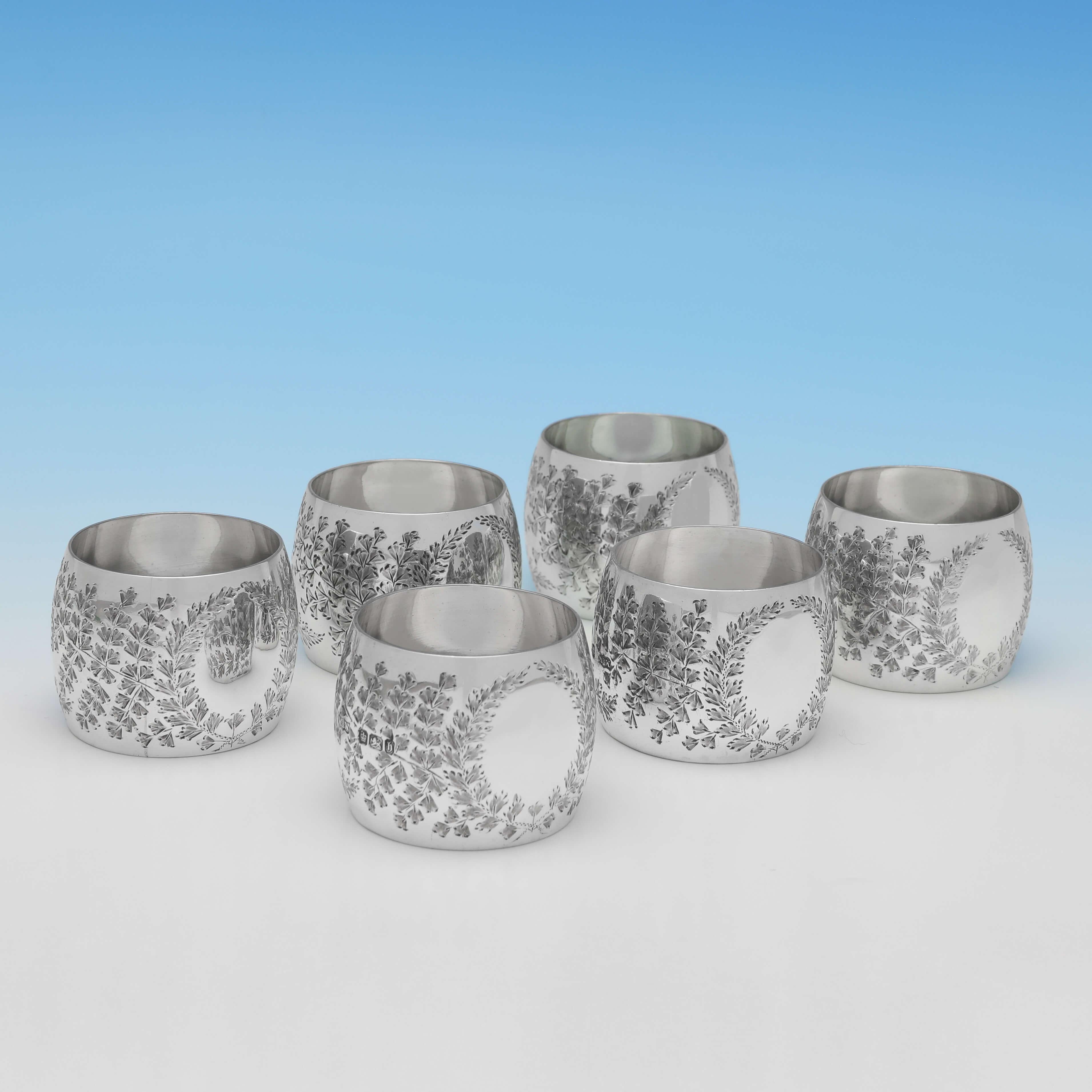 Hallmarked in Sheffield in 1900 by Mappin & Webb, this very attractive set of 6, Antique Sterling Silver Napkin Rings, are presented in their original box, and feature engraved decoration and vacant cartouches. Each napkin ring measures 1.25