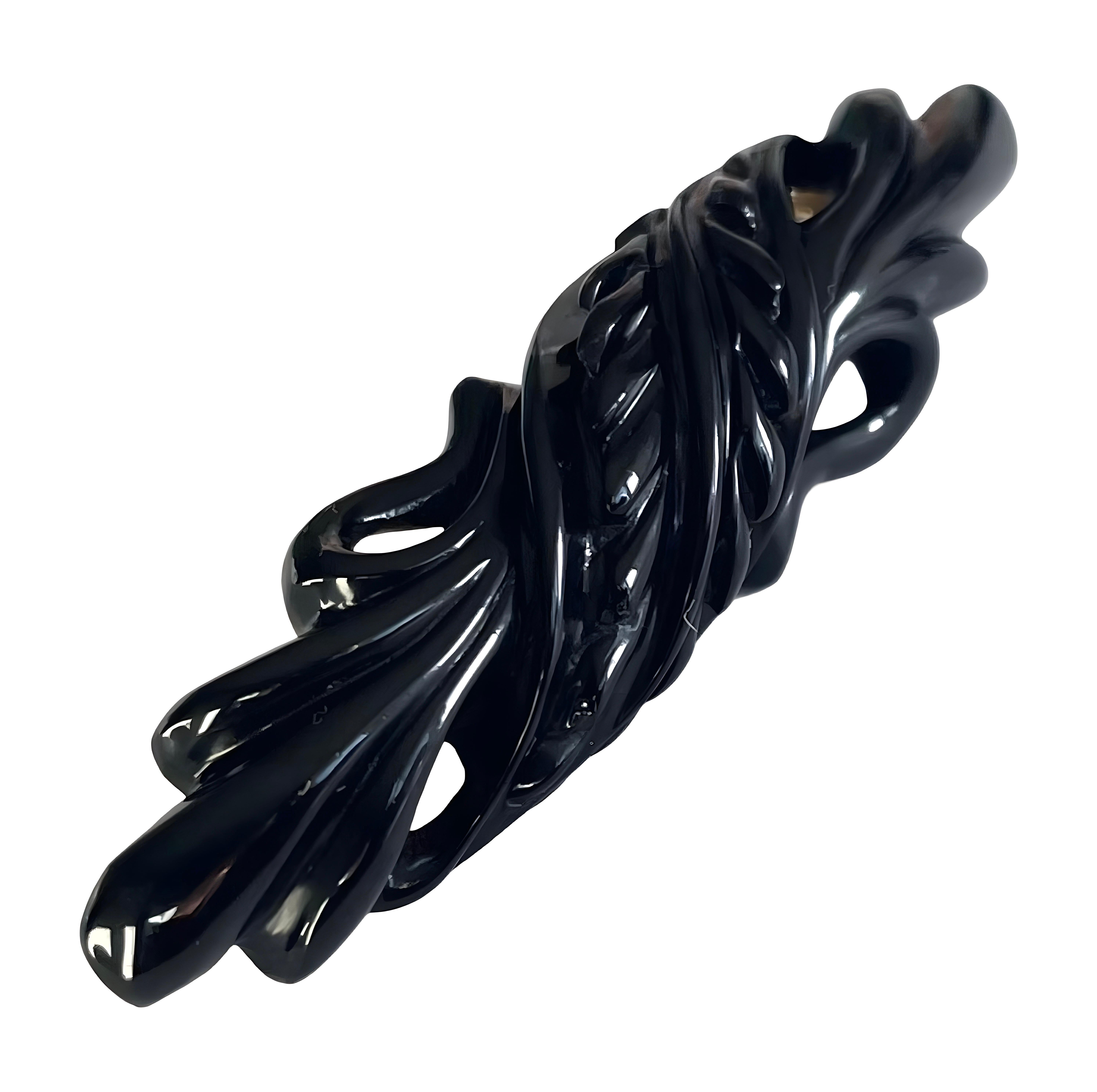 This magnificent Victorian Whitby jet brooch with a distinctive carved design is of superb quality! The master carving, dating around 1880, is intricate and detailed, showcasing the skill of the craftspeople who work with the material.
Whitby Jet