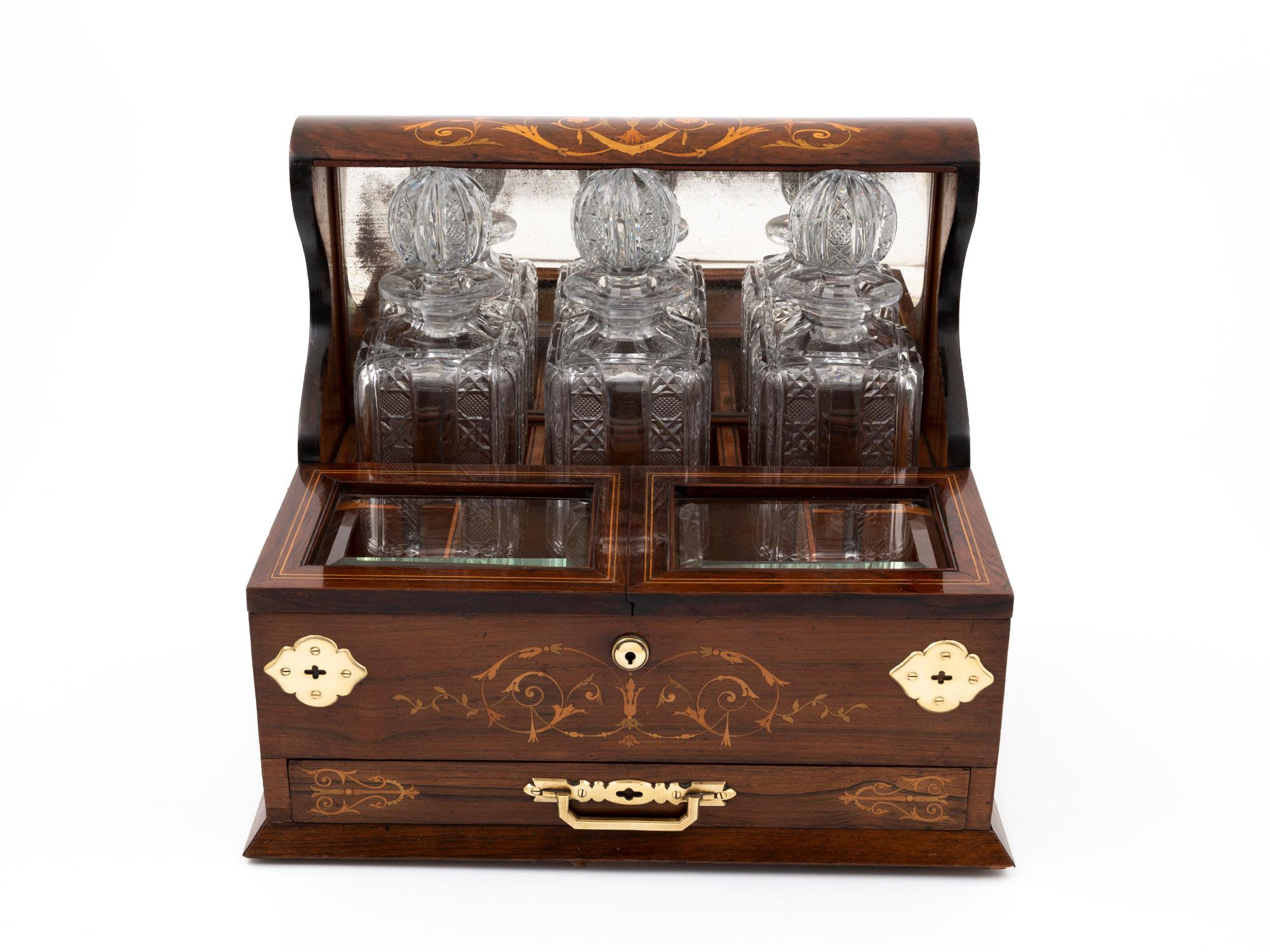 This Humidor Games Box is a monumental piece. Features like Brass mounts surround the box, whilst Brass handles feature on either side, matched with the Brass escutcheon appearing on the front.

Elegantly veneered in exotic Rosewood, this games