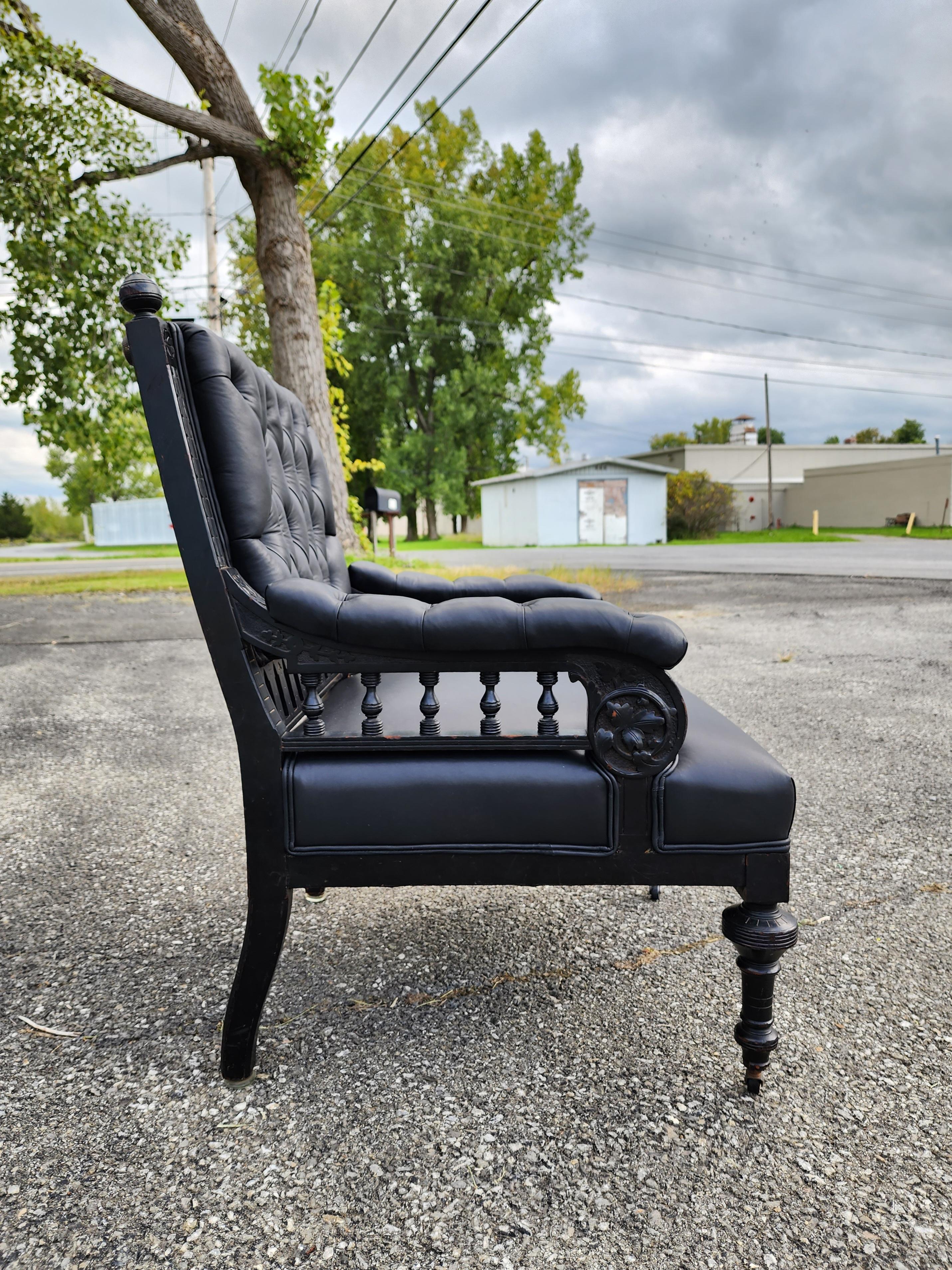 19th Century Library Chair in Carved and Ebonized Wood With Black Leather  For Sale