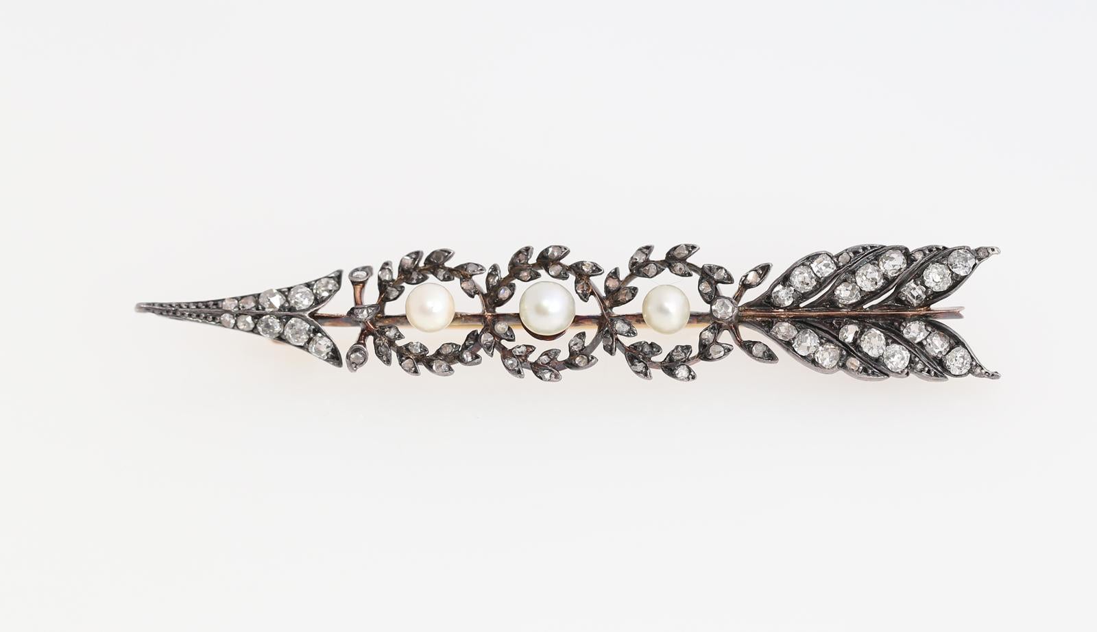 Gold with Silver Rose-cut Diamonds and Pearls arrow brooch. 1895. 

Arrow has been always considered as a sign of love. Once it was common to communicate a message via pin or brooch. Nowadays this art is lost, but we can surely start a new