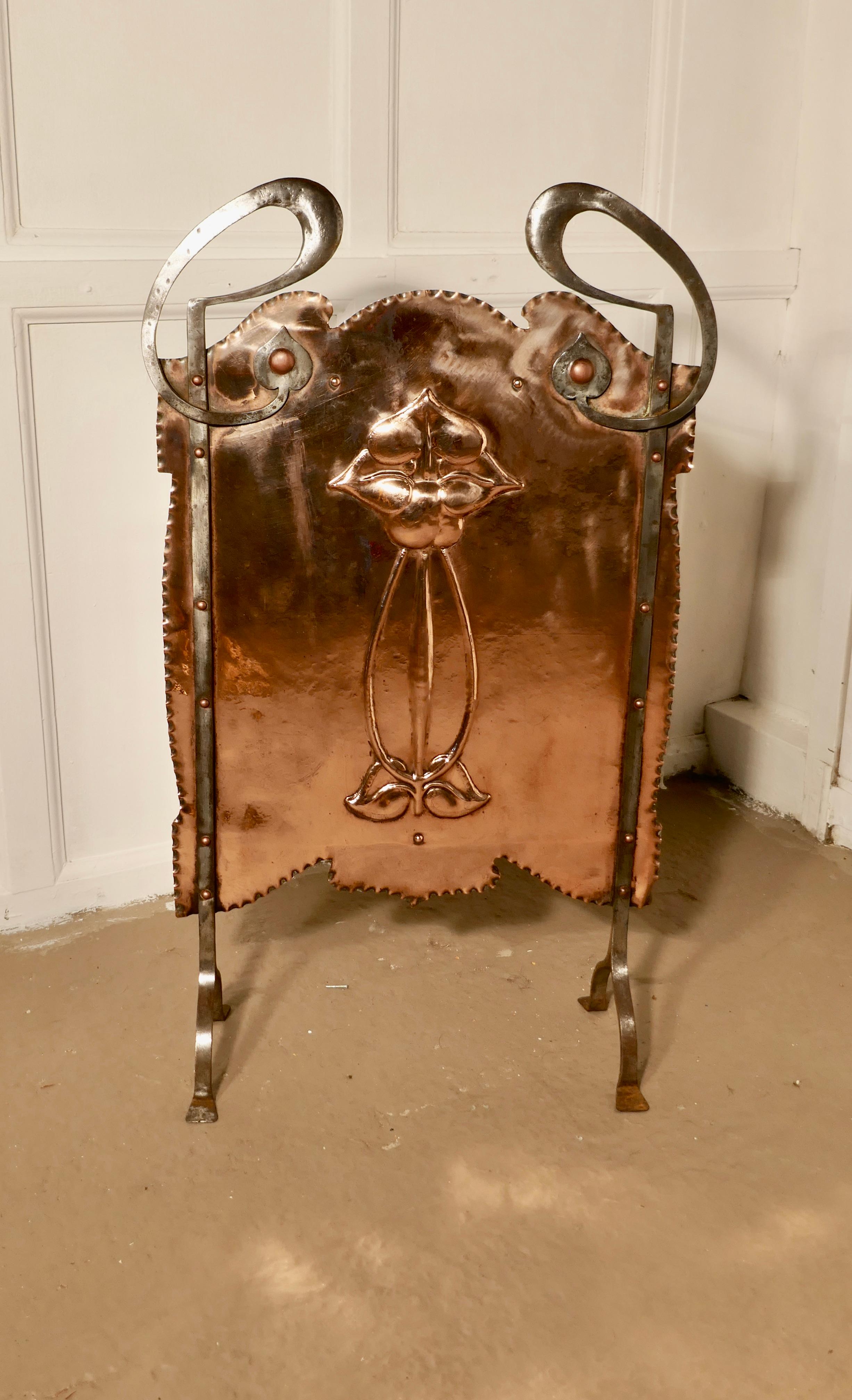 Victorian Art Nouveau copper and polished steel fire screen

This is a Classic Art Nouveau style fire screen, it is a beaten copper screen, which is mounted on very stylish polished steel feet which carry all the way to the top culminating with