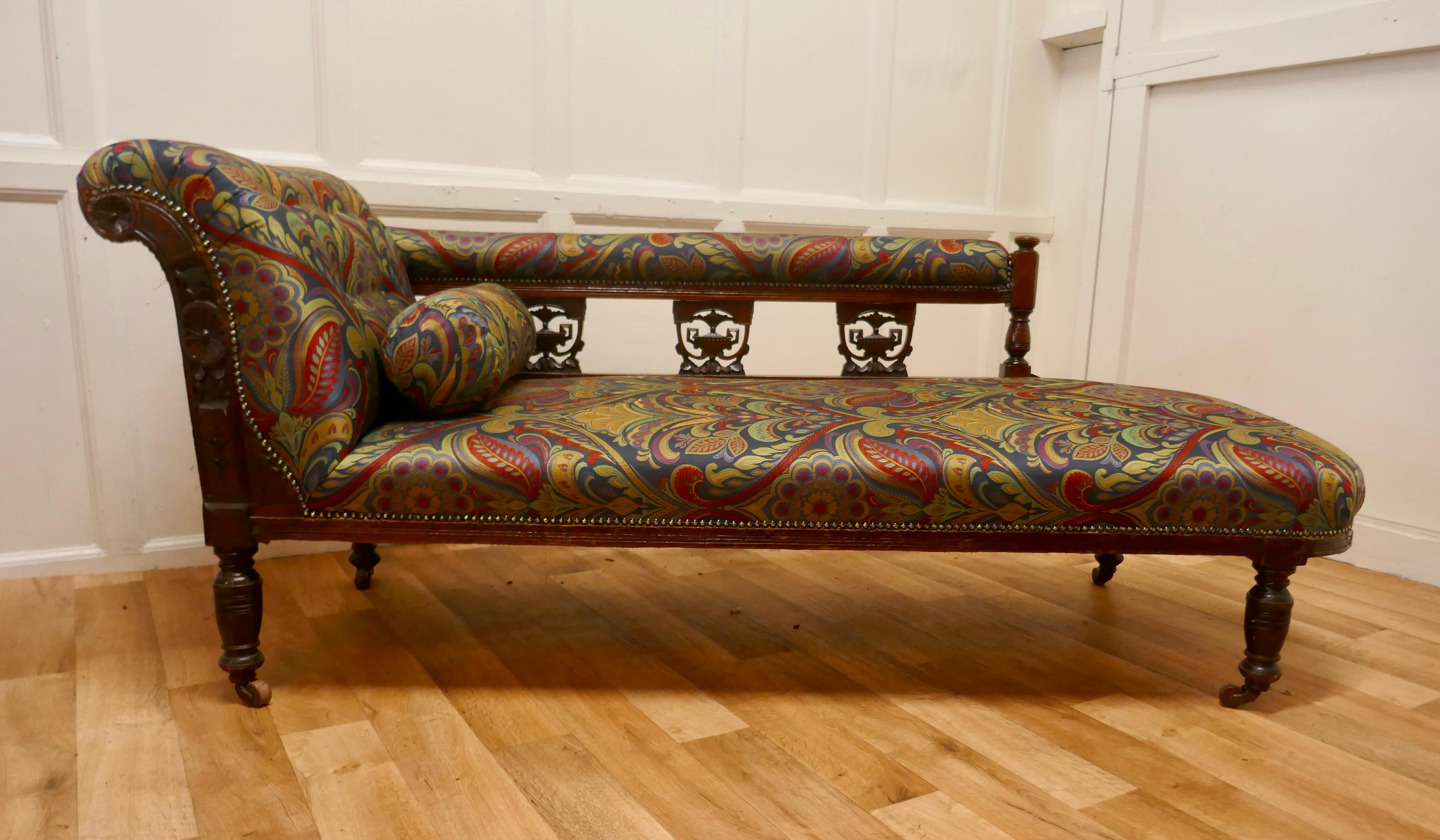 Victorian Art Nouveau upholstered chaise longue.

This is a very attractive sofa it has been newly upholstered with an extra thick Heavyweight Jacquard Fabric, a superb Art nouveau design, Jewel coloured and the design is known as Chastleton