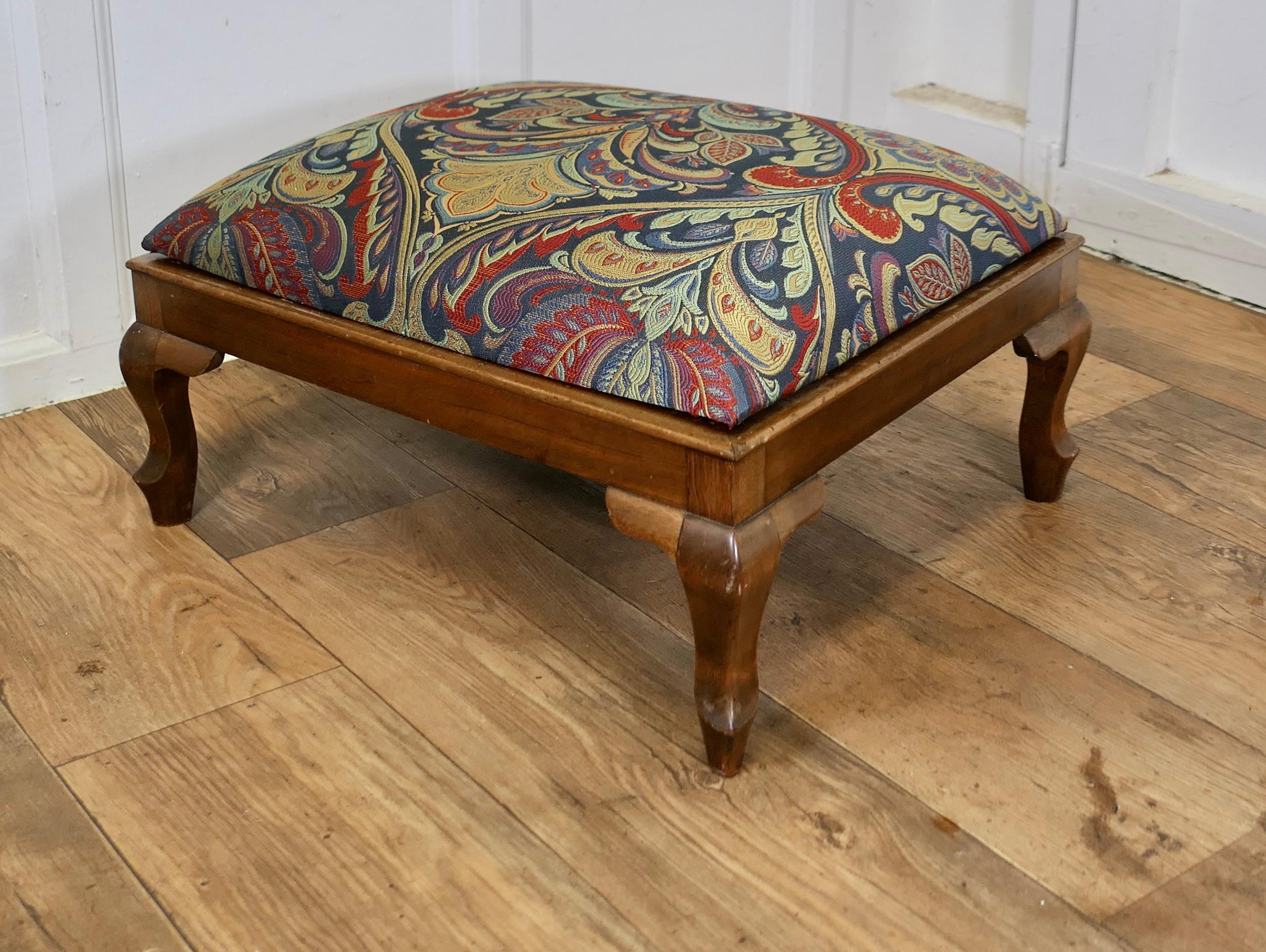 Victorian Art Nouveau Upholstered Foot Stool  

A Lovely piece, this Victorian stool is made inWalnut, it stands on chunky cabriole legs and has been upholstered in an extra thick Heavyweight Jacquard Fabric, a superb Art nouveau design, Jewel