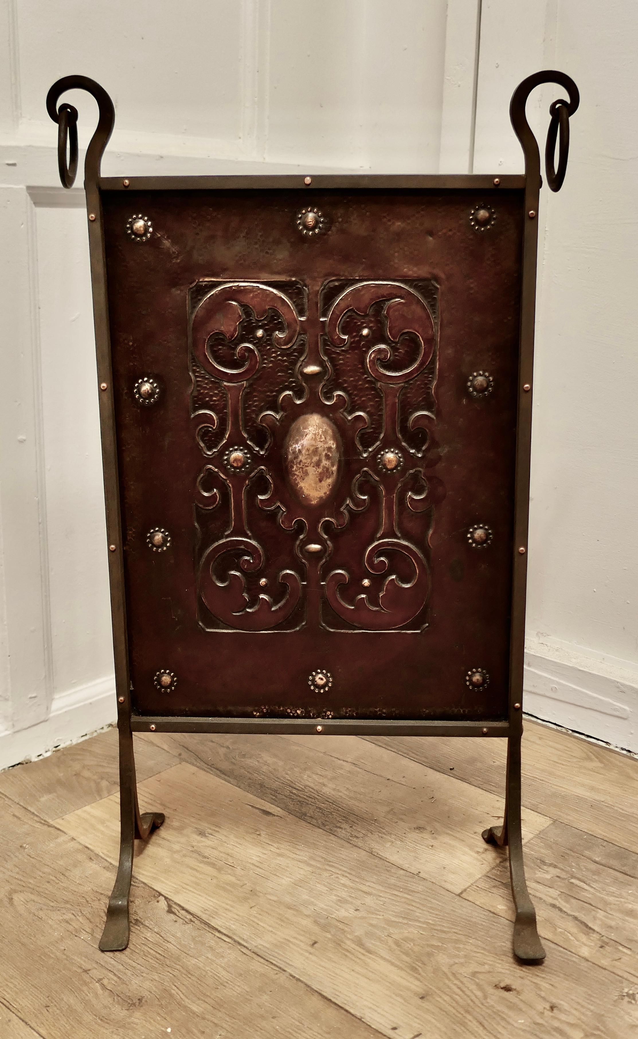 Victorian Arts and Crafts Copper and Iron Fire Screen

This is a Classic in the Arts and Crafts Gothic Style, it is a hand beaten copper screen, which is mounted on a very stylish wrought Iron frame with feet which carry all the way to the top