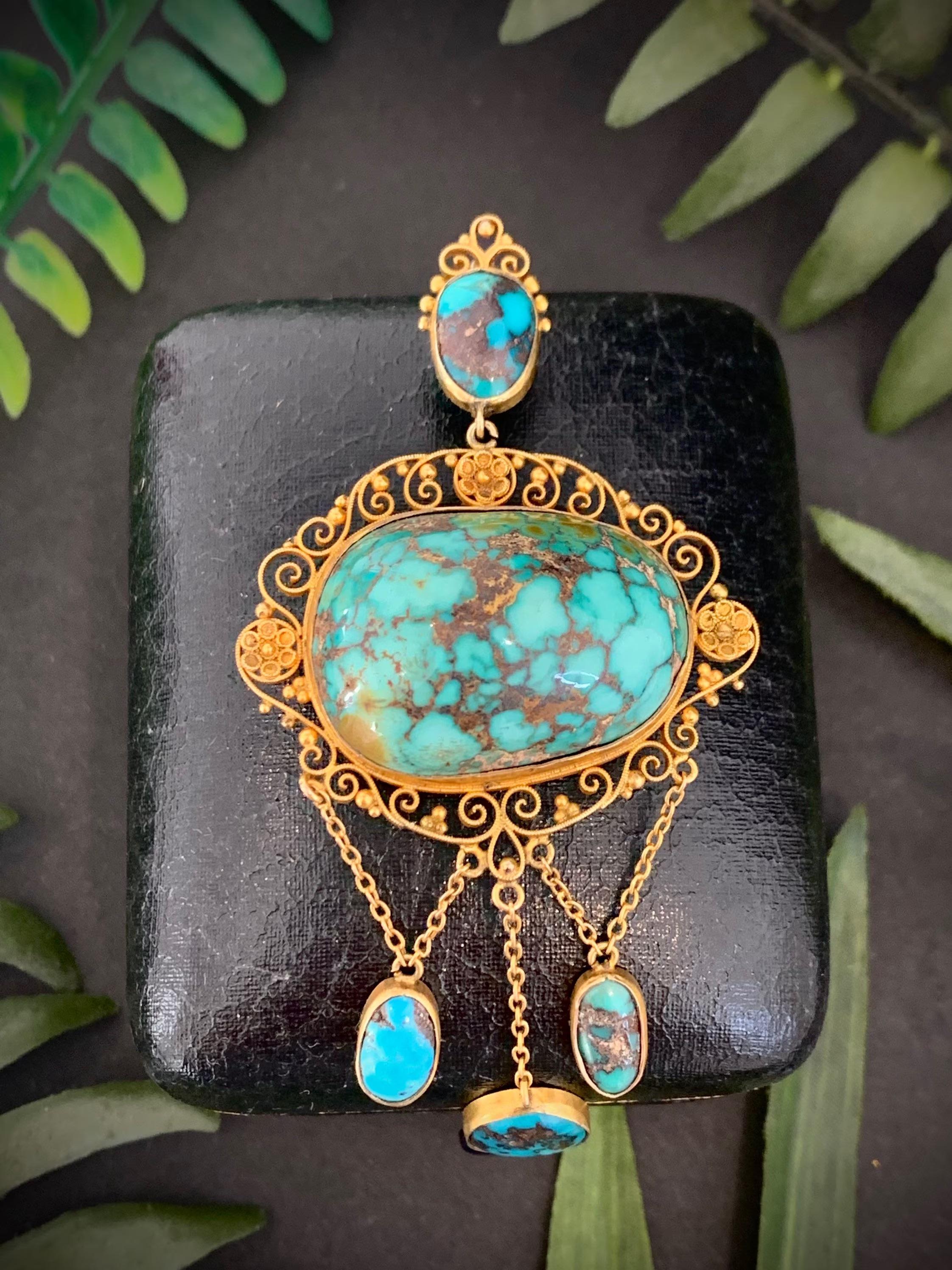 Antique Turquoise Matrix Pendant 

Victorian Circa 1890

15ct Gold

From the Victorian Arts & Crafts Period, Set with The Most Fabulous Natural Turquoise Matrix. Framed Perfectly with the Most Intricate Wire Work- all Crafted by Hand to Fit the