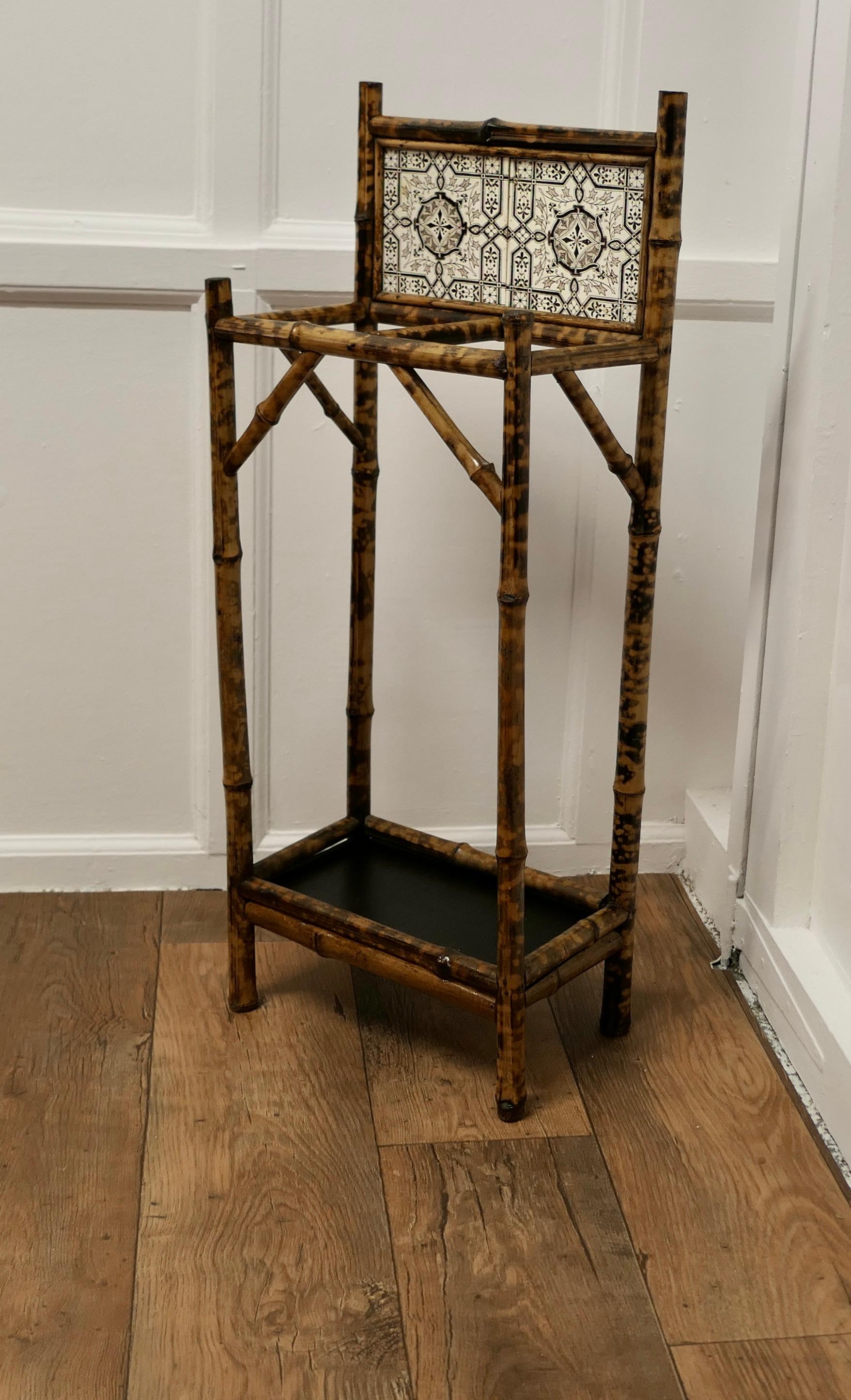 Victorian Bamboo and Tiled Stick and Umbrella stand

A charming little piece, this elegant and very useful stick and umbrella stand has 2 compartments for walking sticks
The stand is made in decorative bamboo and has a tiled back, it is in very