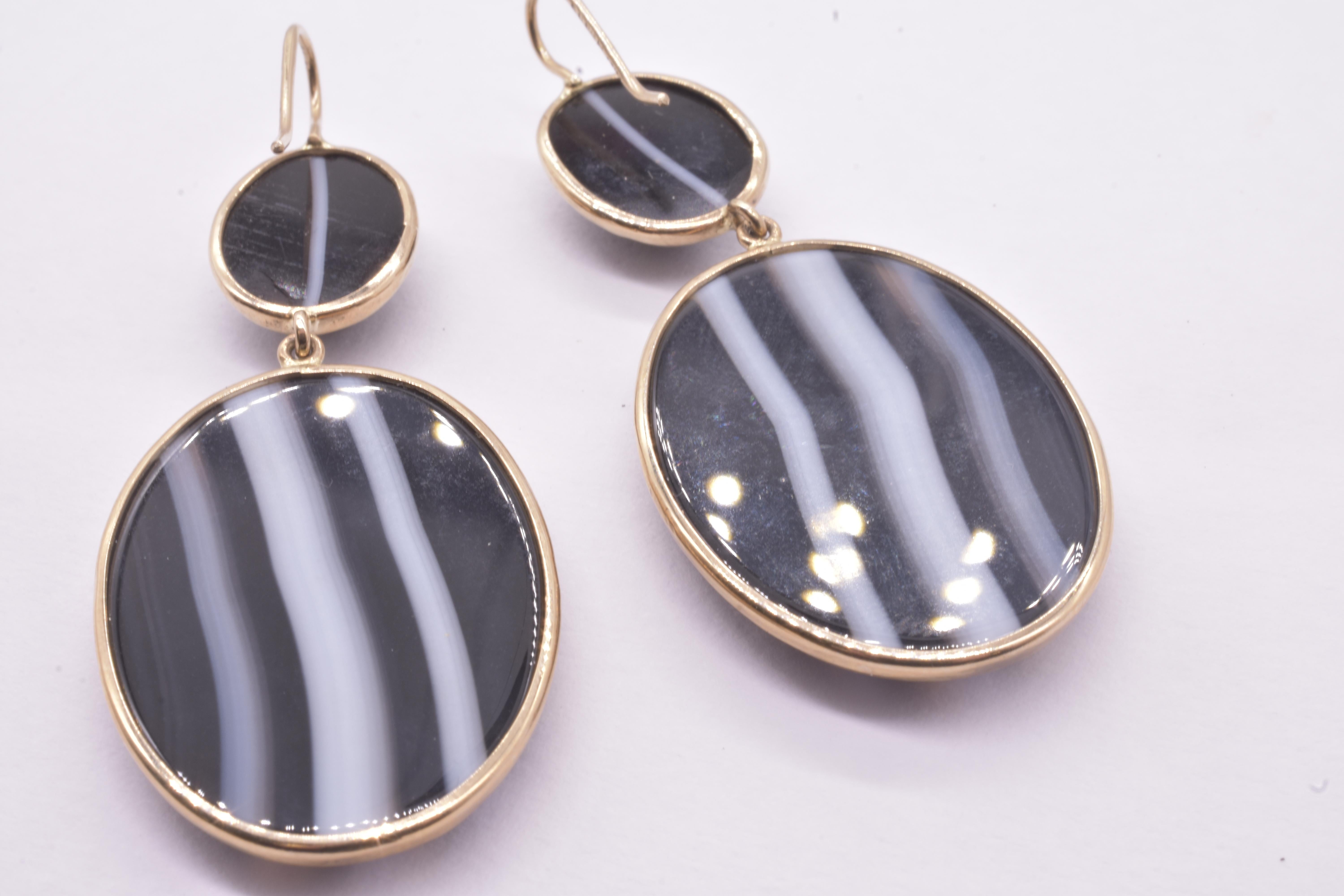 Our 9K Victorian banded agate black and white earrings, though 150 years old, look like they could have been designed today. Polished and pristine, they have white bands (hence: banded agate) that move downward from north to south. The pattern