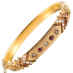 Antique Victorian Bangle Bracelet with Etruscan Detail and Ruby, Diamond and Pearls