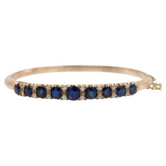 Victorian bangle gold bracelet with sapphires and diamonds.