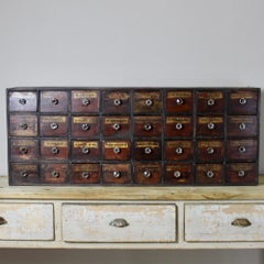 Victorian Bank of Faux Mahogany and Ebonised Chemist or Apothecary Drawers