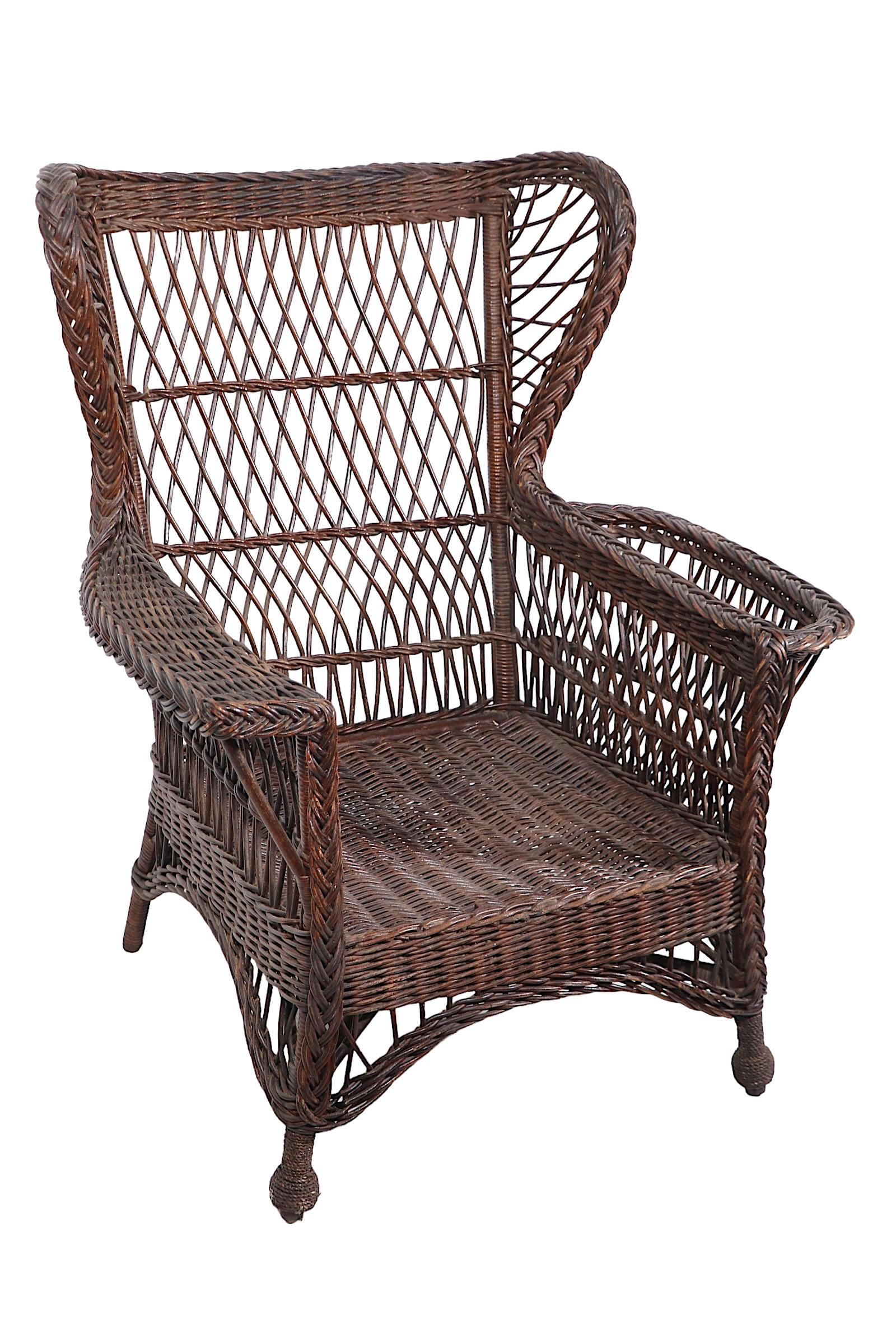 Victorian Bar Harbor Wicker Wing Chair with Magazine Rack Arm en vente 7
