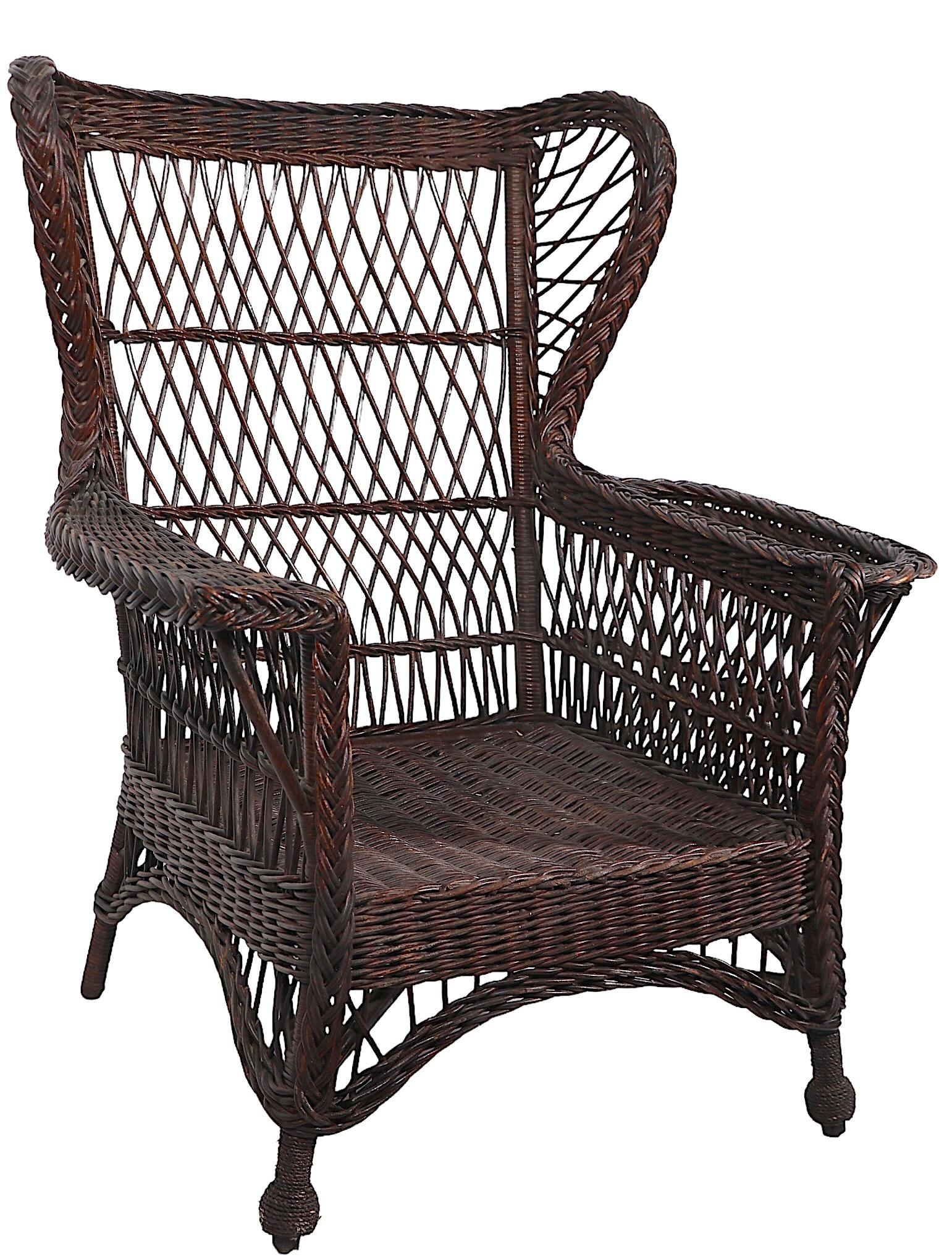 Victorian Bar Harbor Wicker Wing Chair with Magazine Rack Arm en vente 8