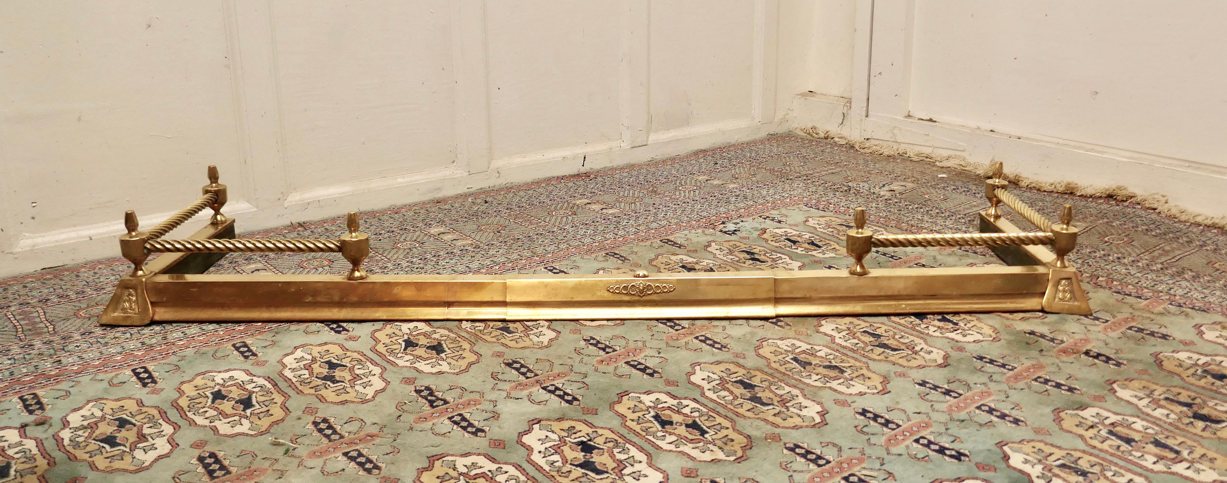 Victorian Barley twist brass fender 

This is a very attractive brass fender it has a brass base with a barley twist brass rail above and small decoration to the corners of the base

The fender is in very good condition it is 7” high, 56” long