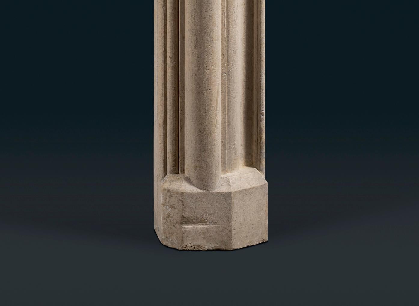 An antique Victorian Bath Stone bolection fireplace surround, featuring a deep and complex ogee mould frame raised on chamfered block feet.

English, nineteenth century, in late 17th-century style.

The bolection mould fireplace became fashionable