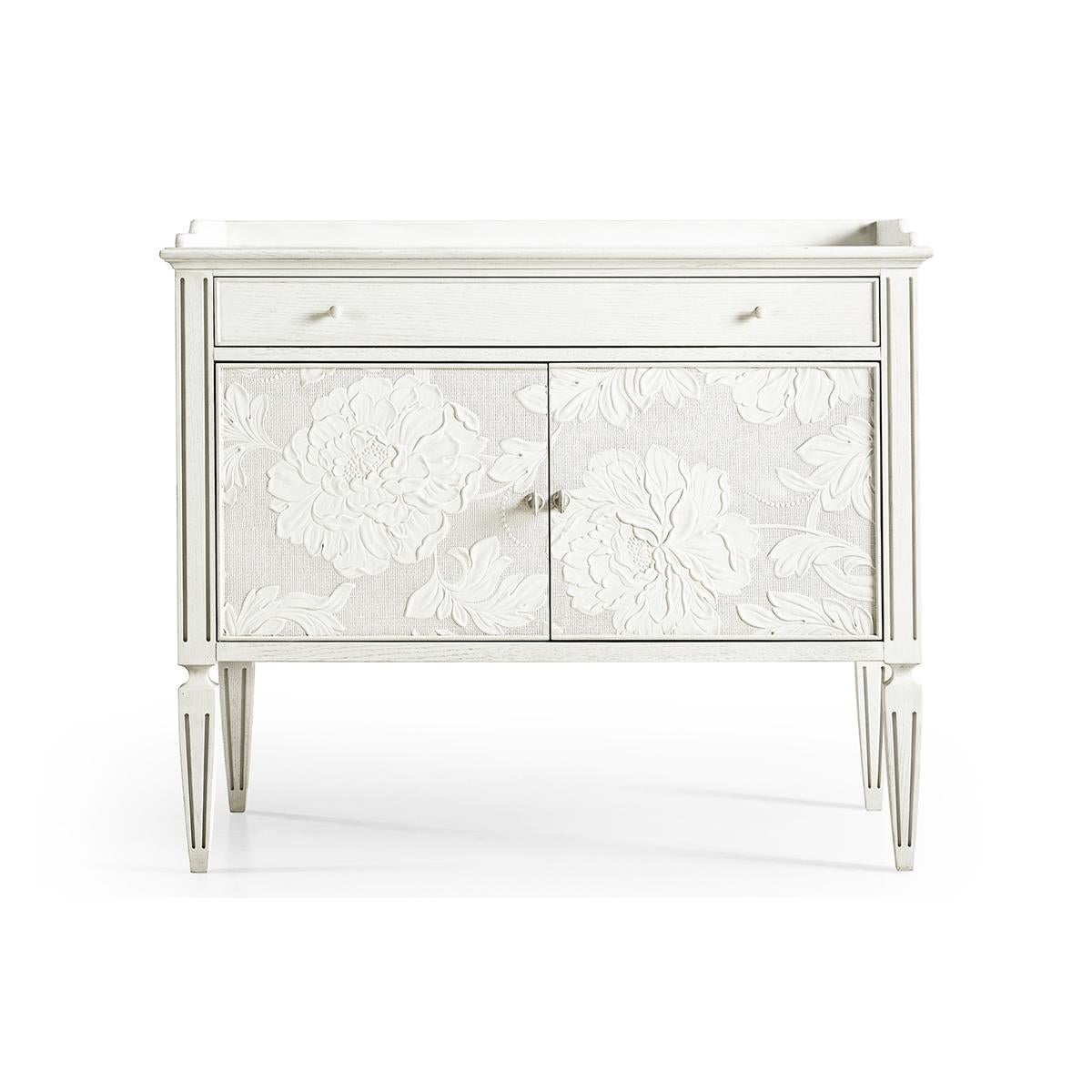 Victorian bedside cabinet, combining the style and aesthetic artistry of Victorian refinement with delicate floral patterns painstakingly crafted combining wallpaper and plaster sculpting techniques. With a three quarter galleried top, single long