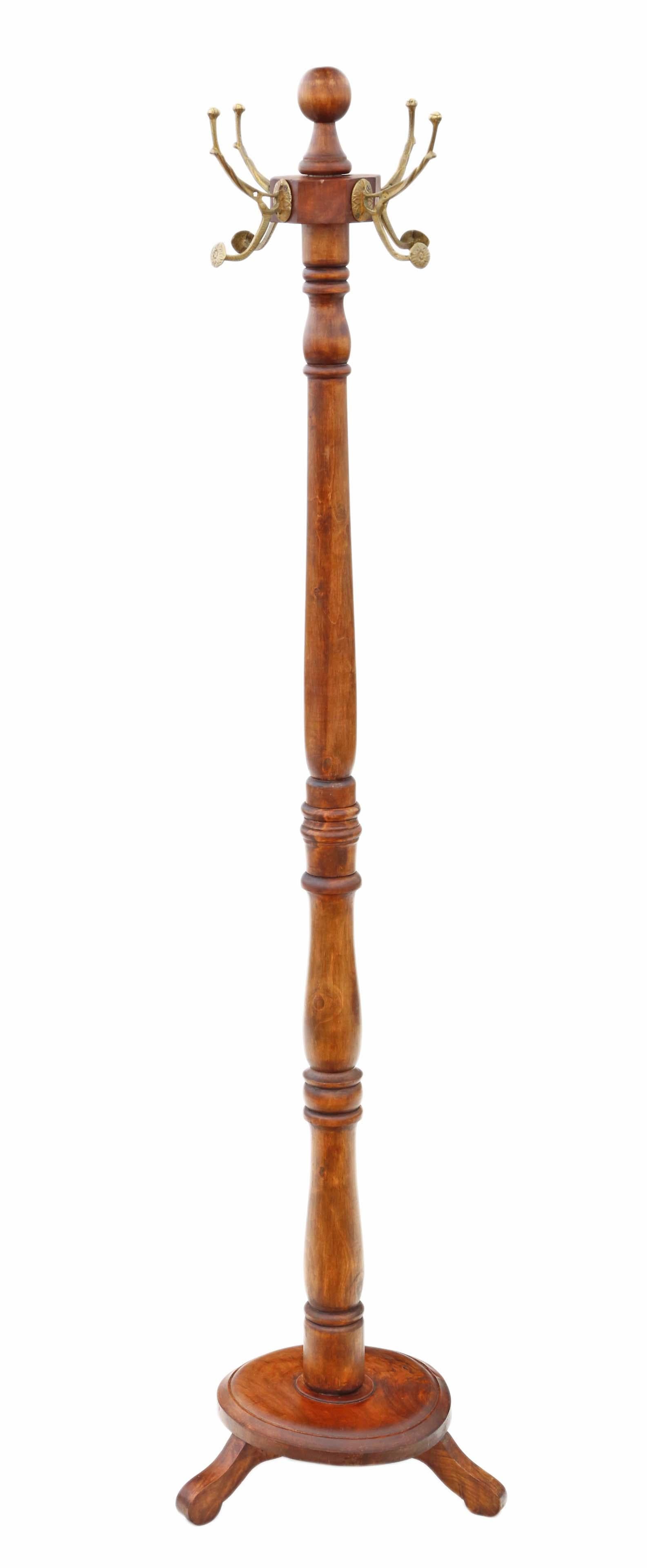 Antique quality Victorian beech and walnut coat, hat, stick, umbrella stand circa 1870
solid and heavy, with no loose joints. Classical 19th century styling with ormolu brass hooks. A rare find.
Rotating top and unscrews at the centre for