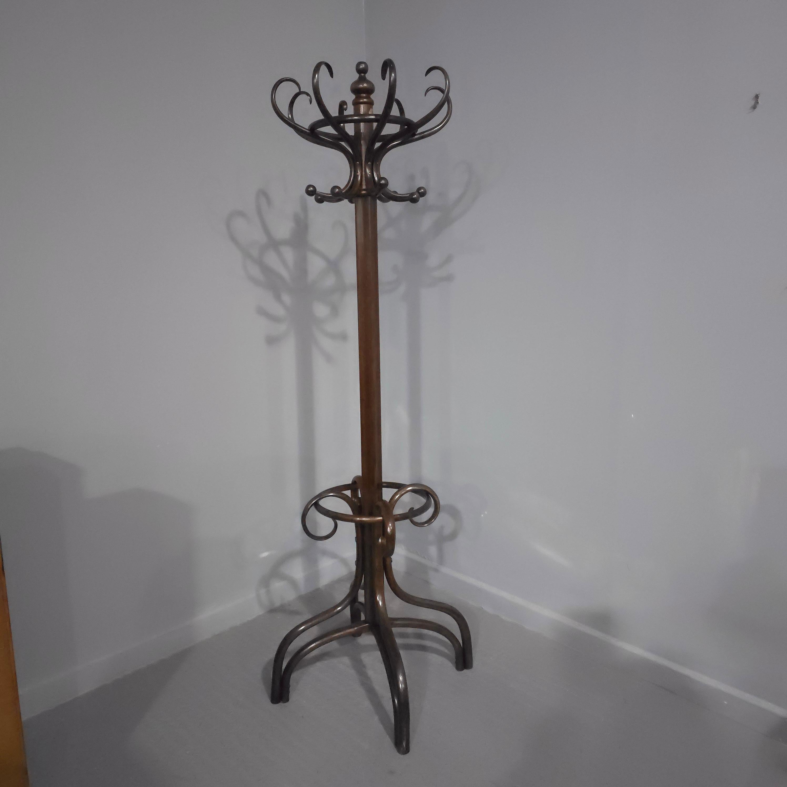 A very good quality Victorian swivel top bentwood coat and stick stand, in overall excellent condition.

79