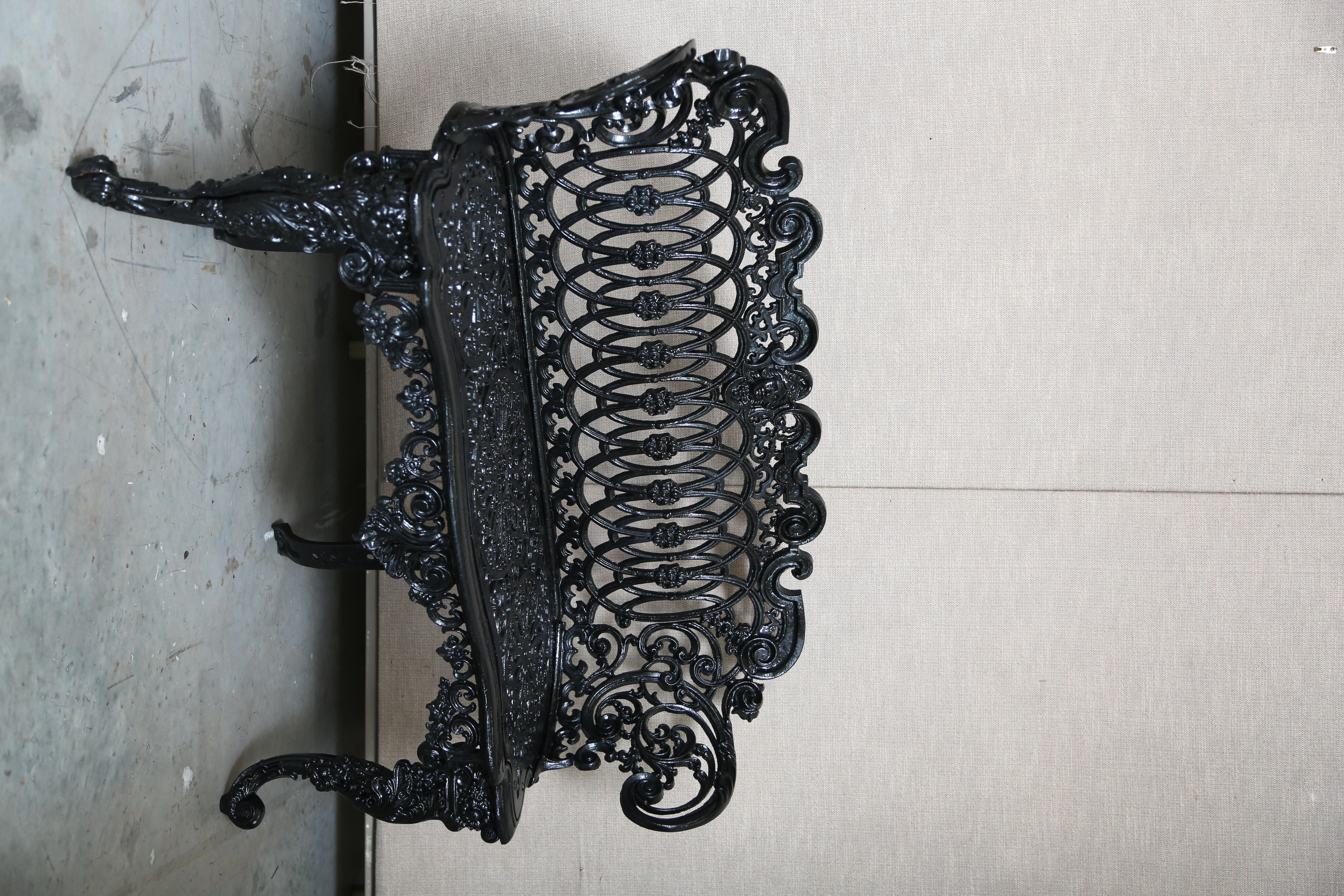 Betsy Ross pattern Victorian cast iron garden bench. The iron work is superb with the face of Betsy Ross in the center back. Rolled arms and scrolled legs define this bench. This pattern is desirable and hard to find. It has been restored and