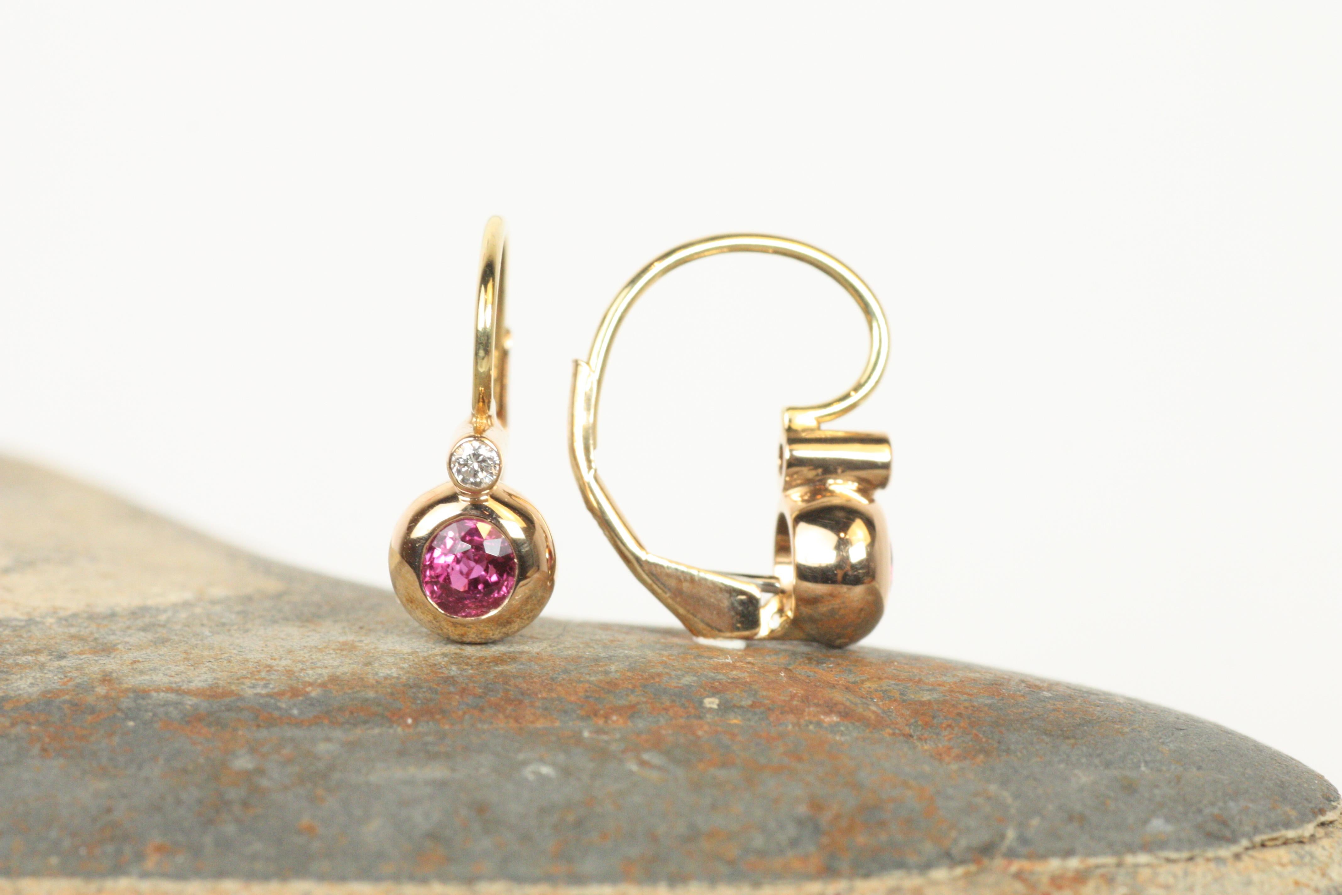 These stunning Victorian Bezel Earrings feature rubies and diamonds, set in 18K rose gold with 14K yellow gold French backs. The romantic combination of rubies and rose gold adds a soft, feminine touch, while the Victorian-inspired design brings