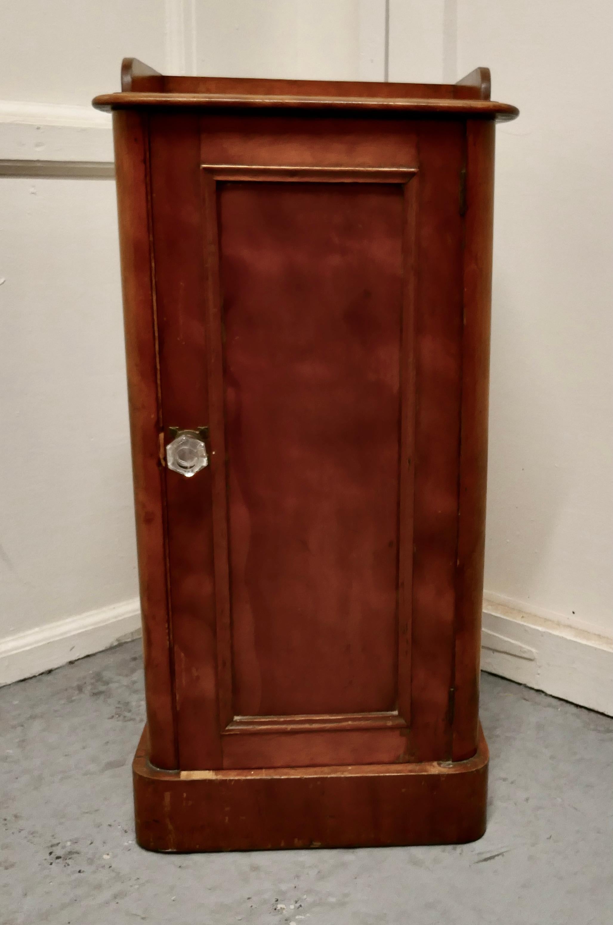 Victorian birch bedside cupboard.

This is a charming and attractive piece, it is made in flame Birch with a gallery around the top, the door is panelled and there is a shelf inside.
The cabinet is in good condition, it is 31.5” tall, 16” wide