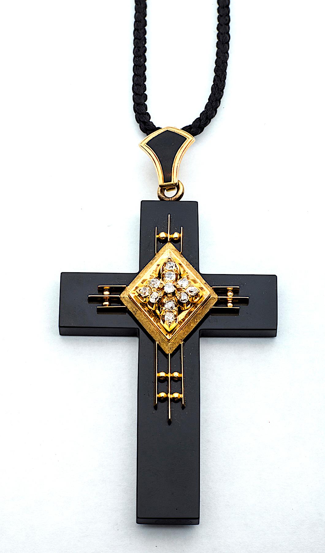 A graphic mix of white, black, and gold makes this divine Victorian cross, circa 1875, look oh so modern and stylishly up-to-date.  The handmade black onyx cross is 2 13/16
