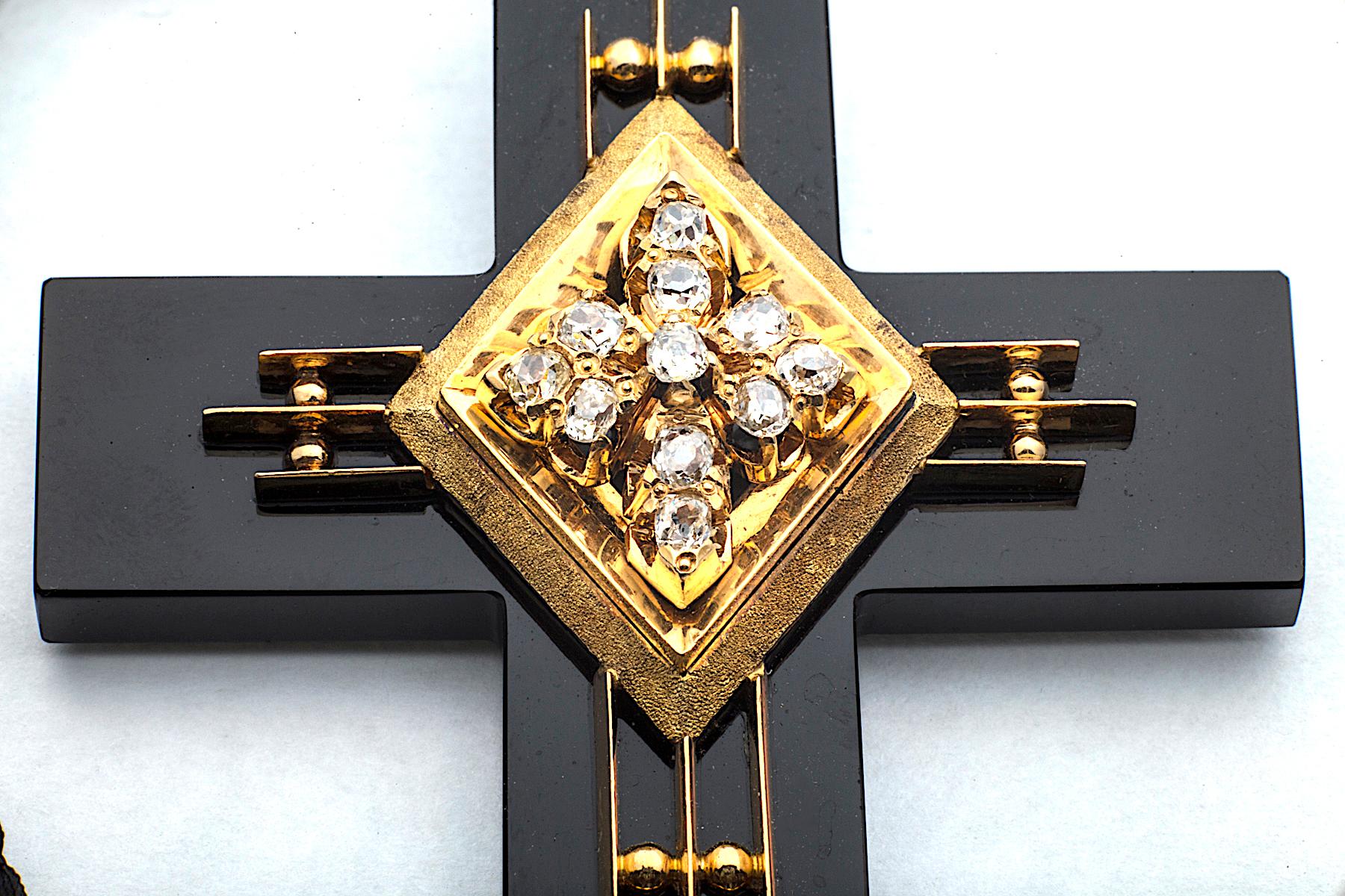 black onyx and gold cross pendant