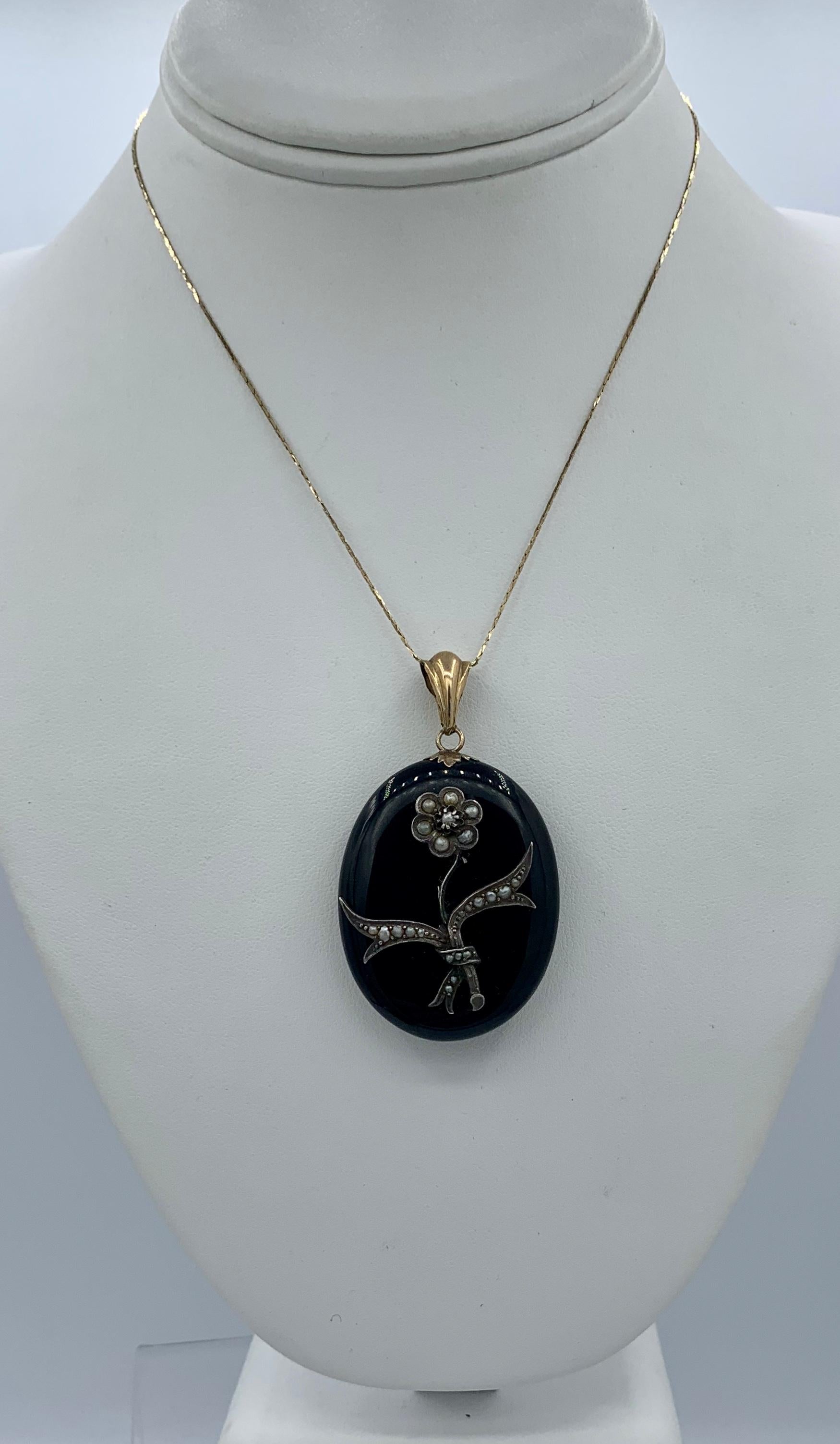 Victorian Black Onyx Locket Necklace Flower Motif Gold Pearl, Circa 1860 In Good Condition In New York, NY