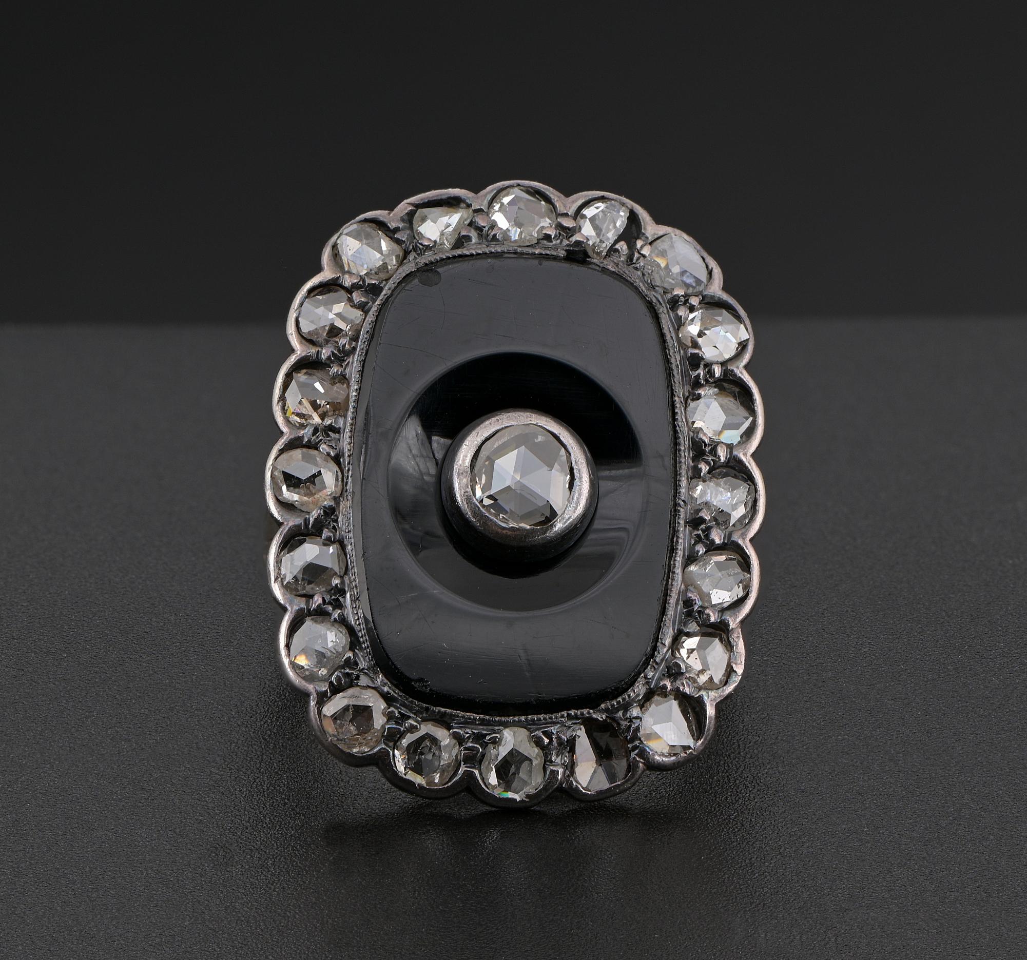 This beautiful Black Onyx and Diamond ring is 1890 ca
Skillful hand crafted throughout of solid 18 Kt gold with some silver portion
Fantastic wide panel design expressed on a hand carved Black Onyx plaque highlighted by a center Rose cut Diamond