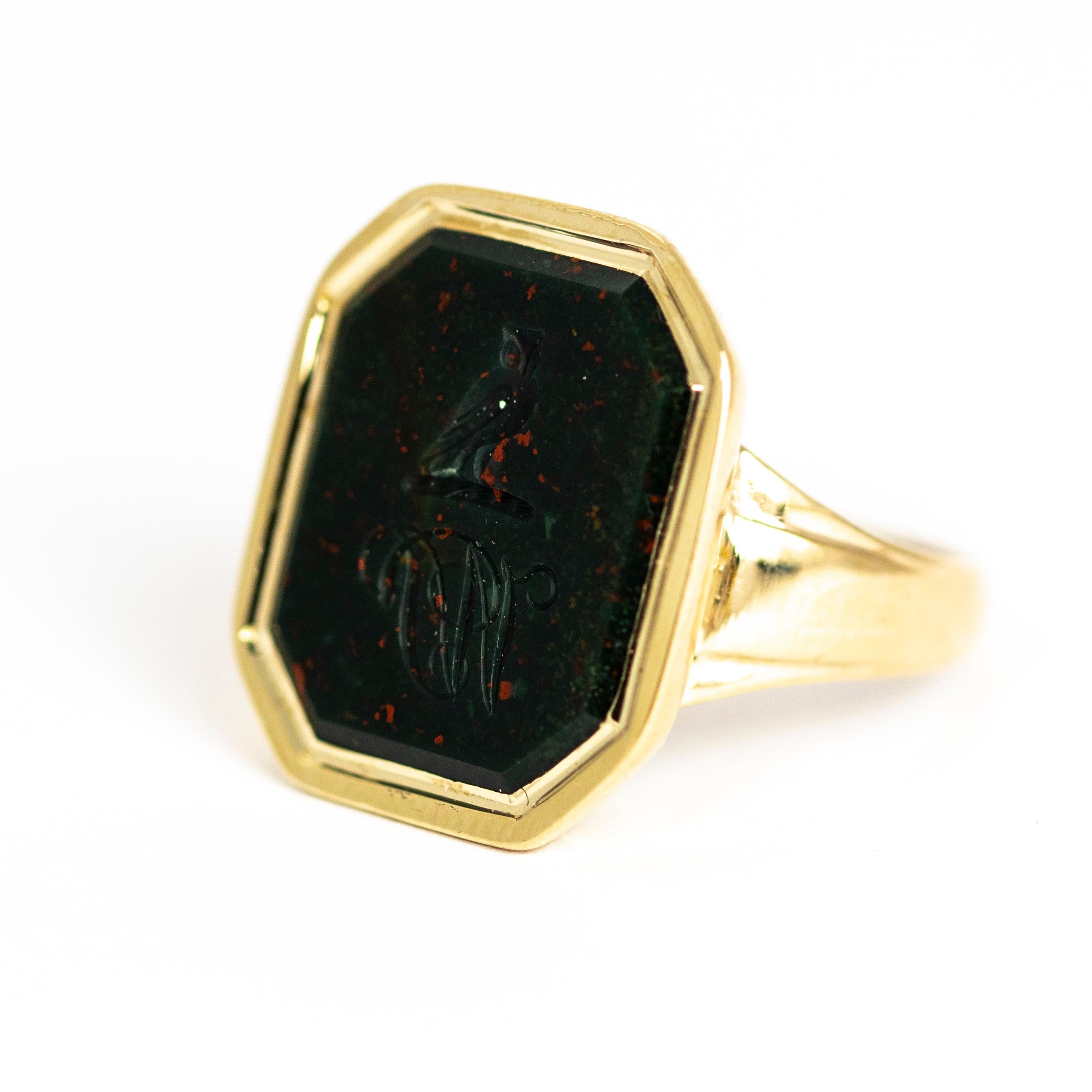 This wonderful Victorian 9ct gold ring holds a beautiful glossy bloodstone engraved with a delicate owl and initials sat upon a shiny gold platform. Made in London, England.

Ring Size: R or 8 1/2